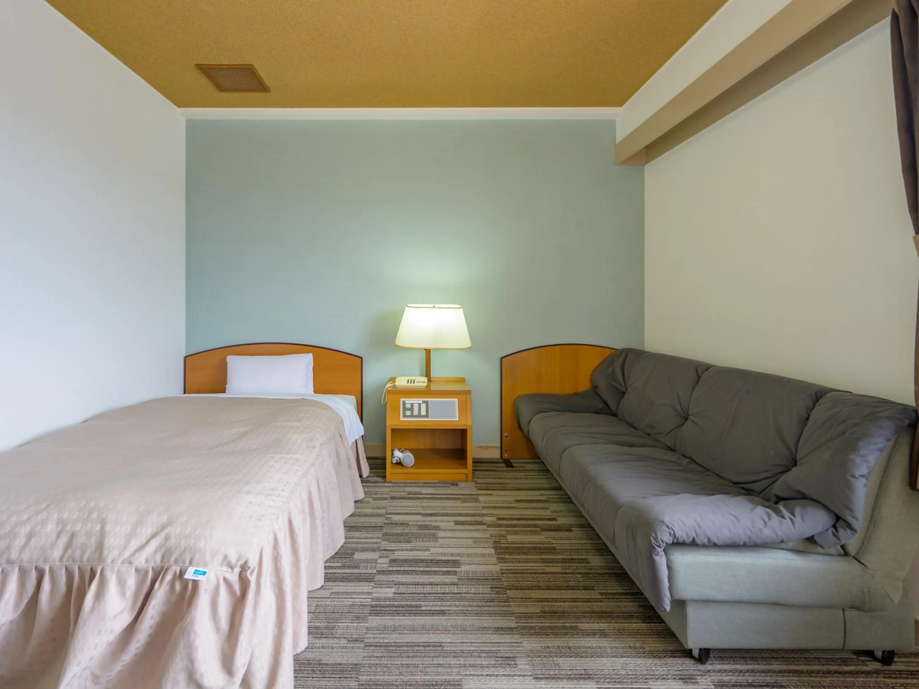 Photo of the whole room, Bed in Hisai Green Hotel