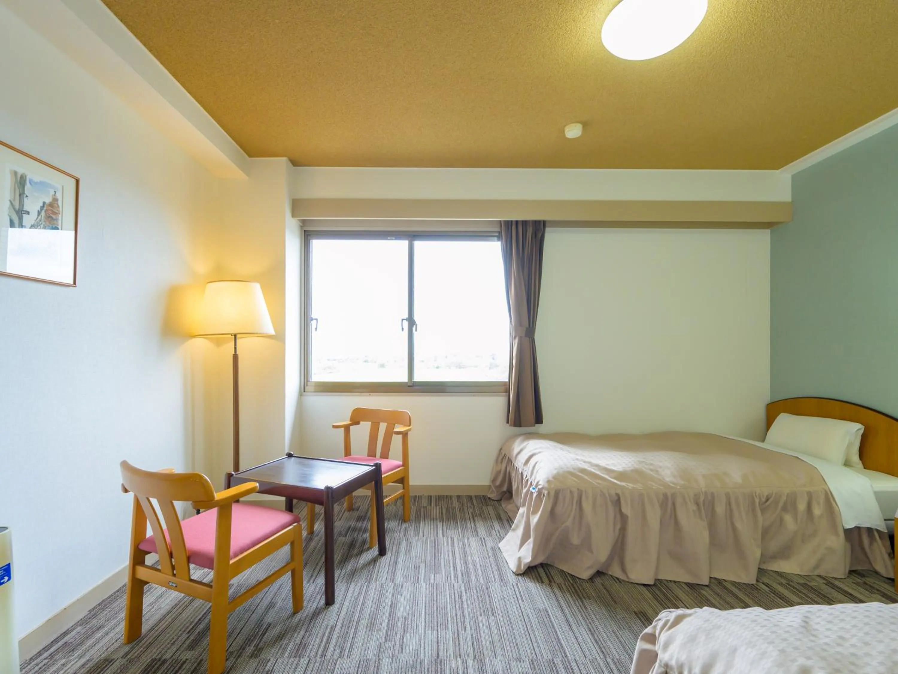 Photo of the whole room, Bed in Hisai Green Hotel