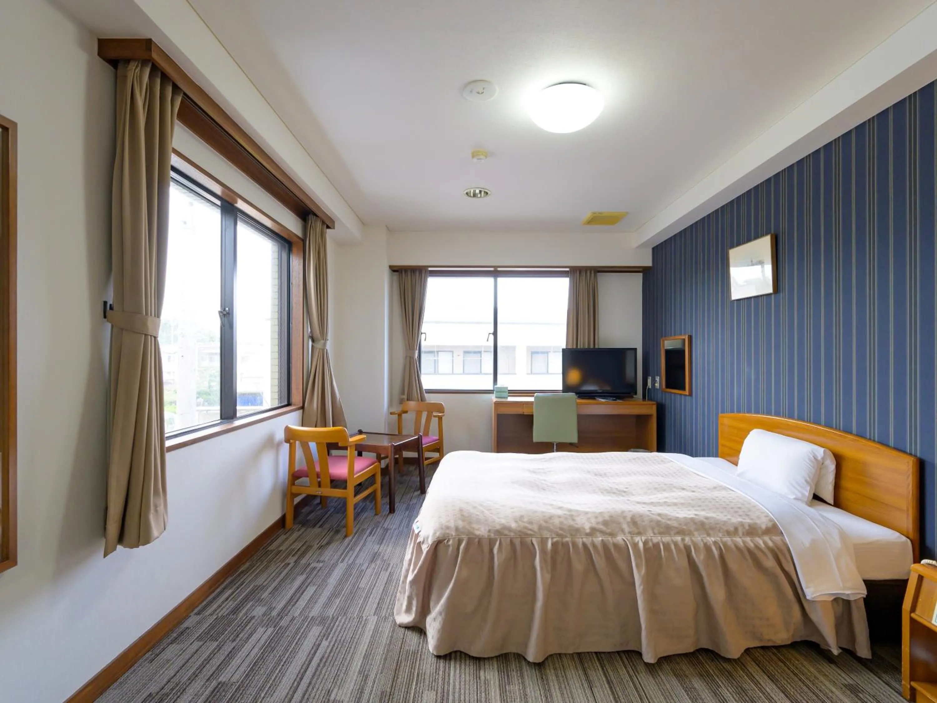 Photo of the whole room, Bed in Hisai Green Hotel