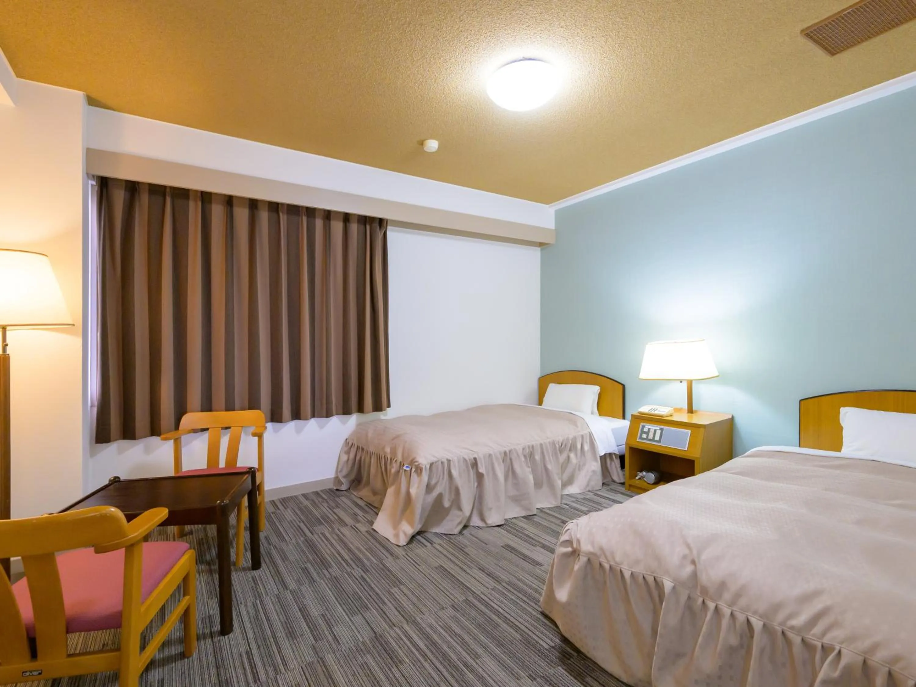 Photo of the whole room, Bed in Hisai Green Hotel