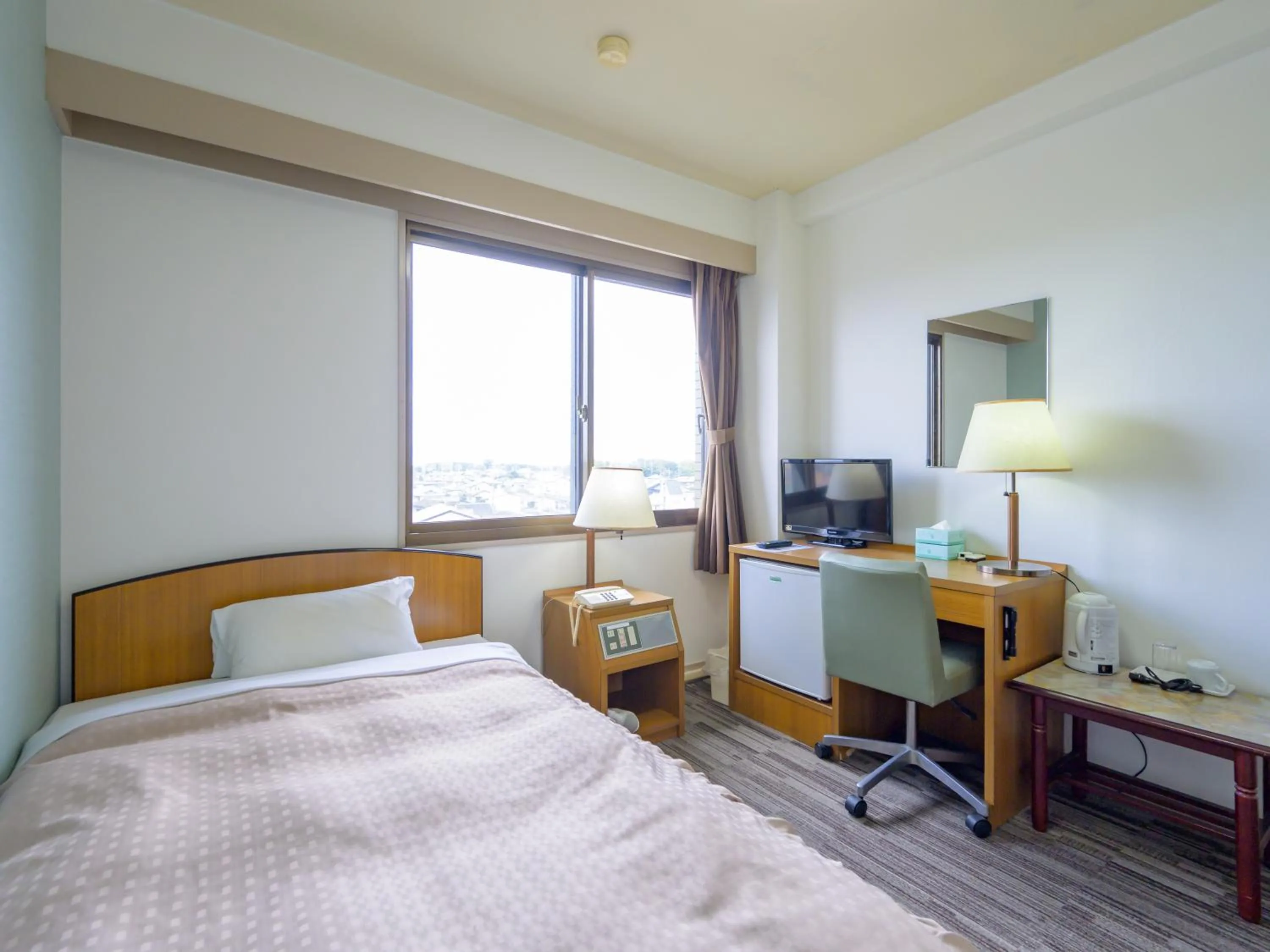 Photo of the whole room, Bed in Hisai Green Hotel