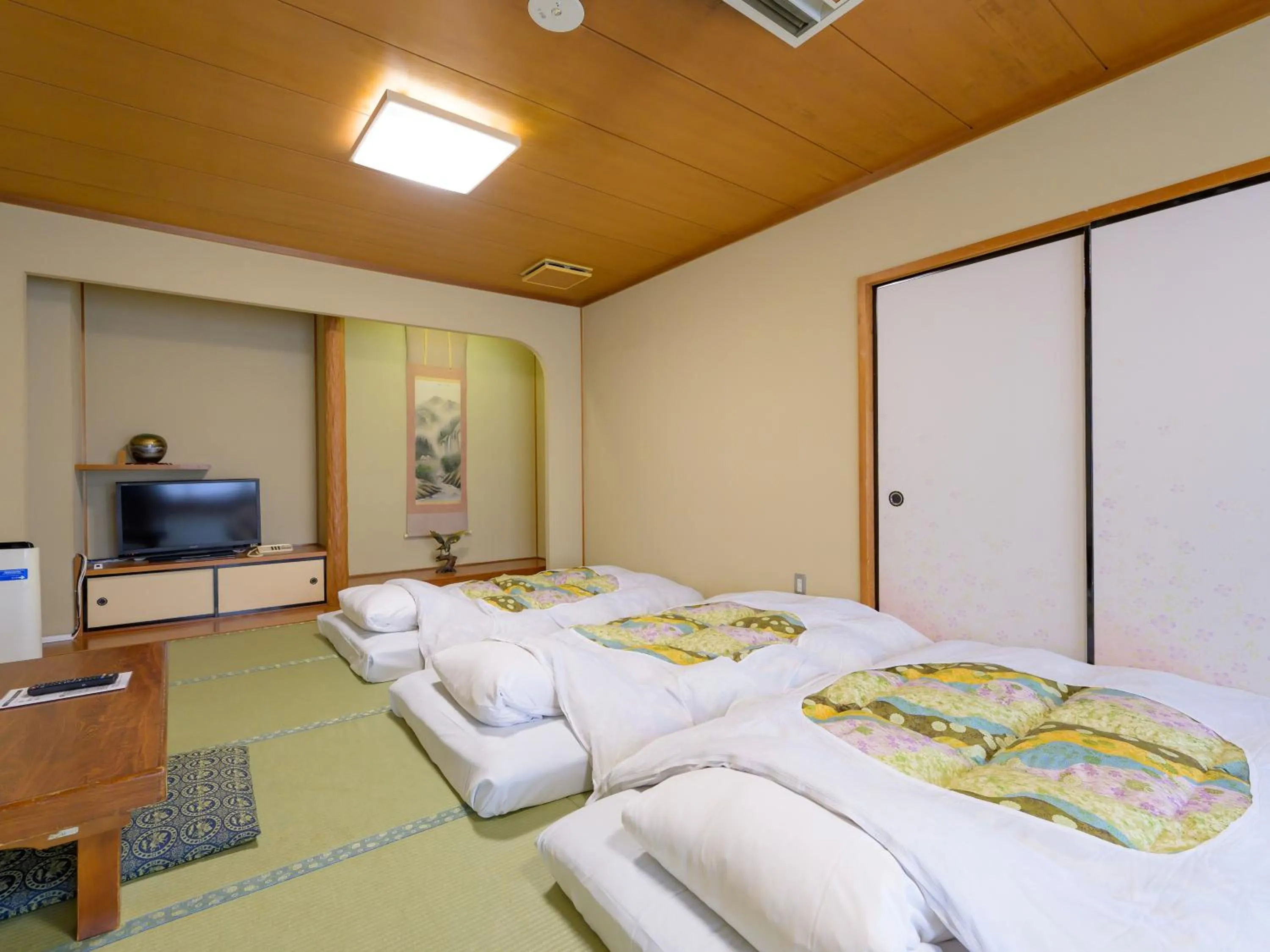 Photo of the whole room, Bed in Hisai Green Hotel