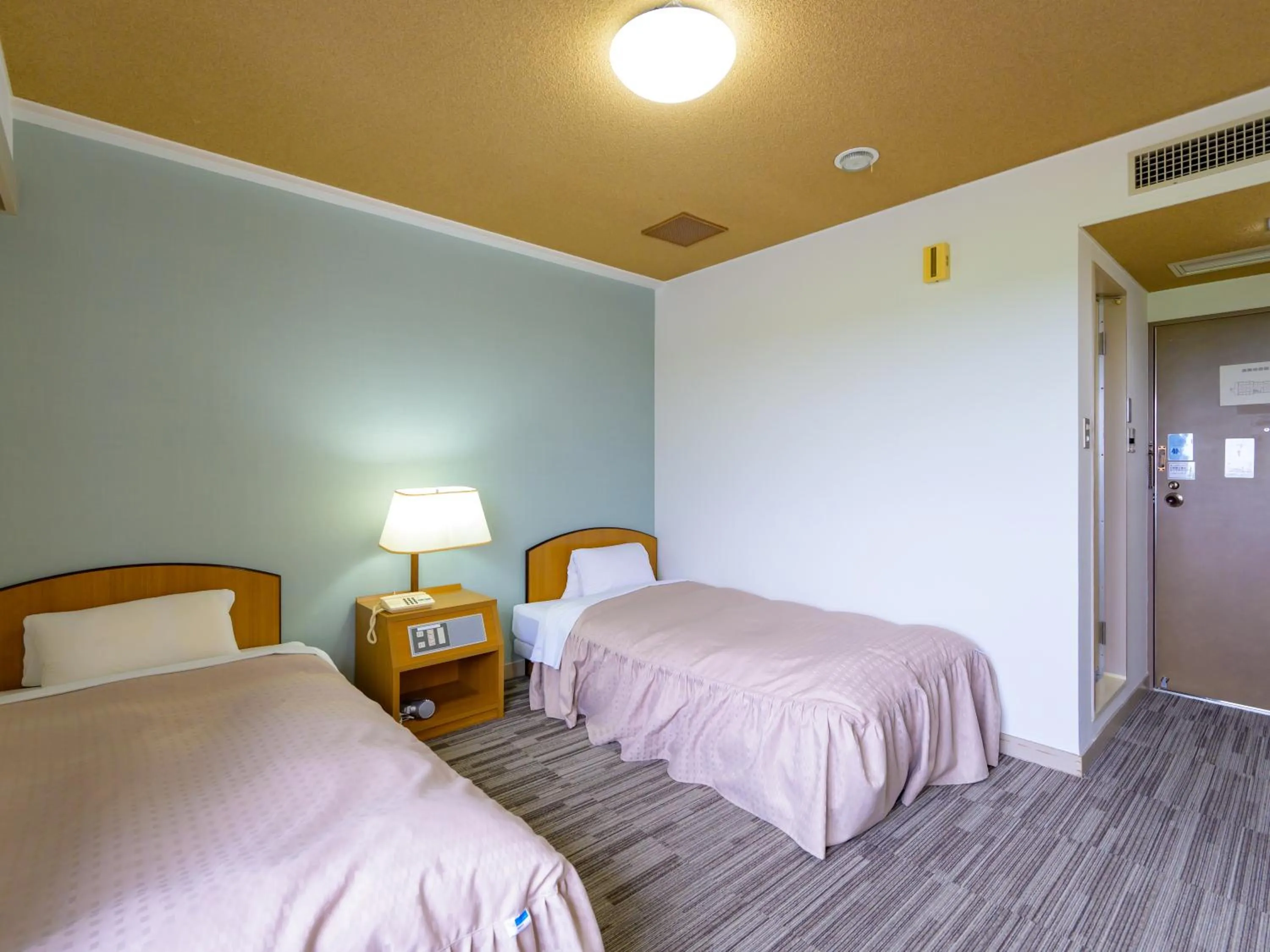 Photo of the whole room, Bed in Hisai Green Hotel