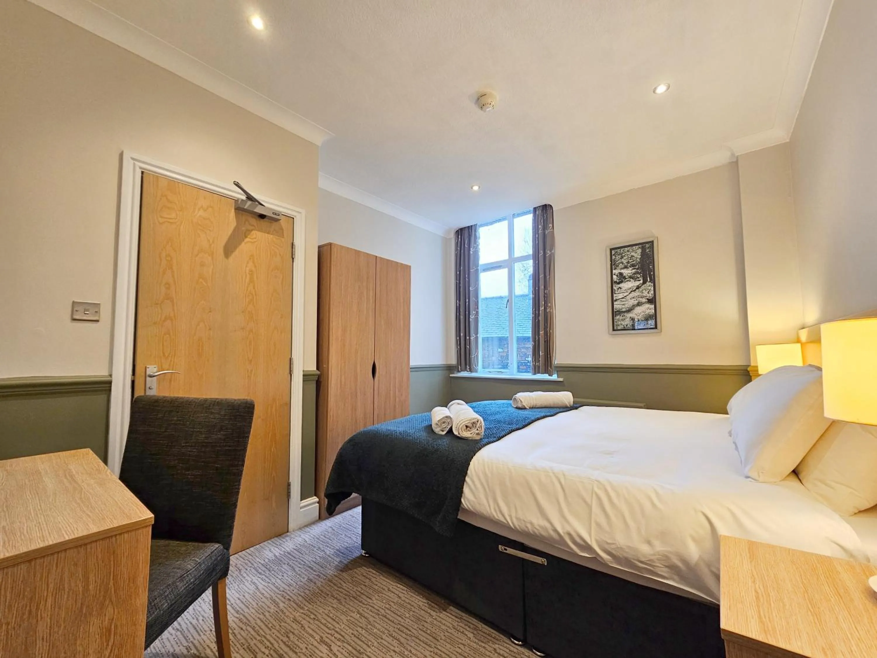 Bed in Derwent Manor Apartments