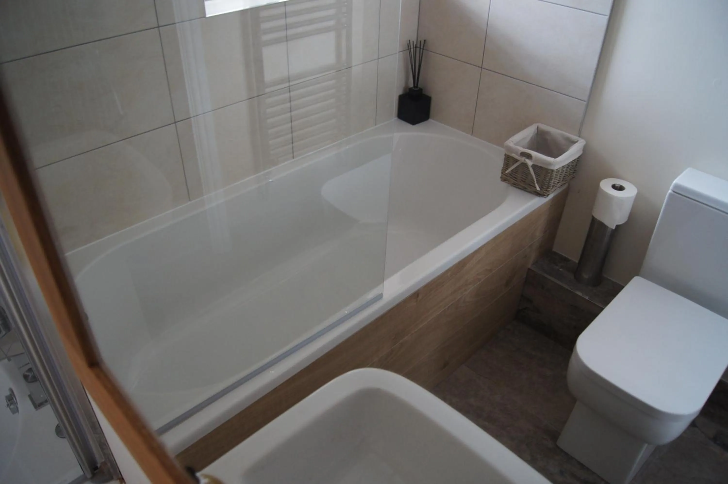Bathroom in Romneys Apartments & Suites