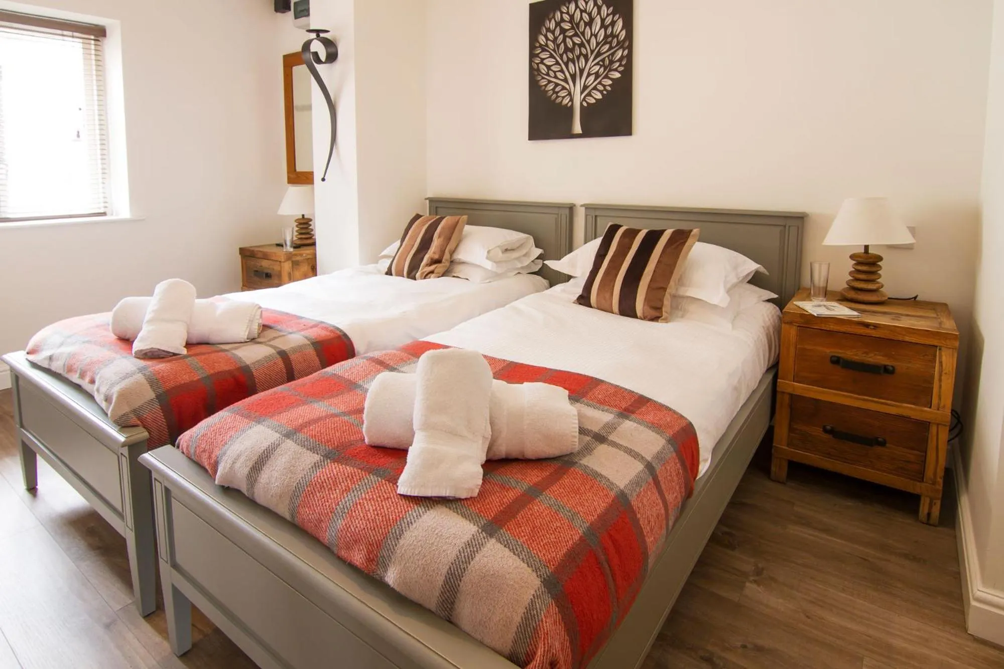 Bedroom, Bed in Romneys Apartments & Suites