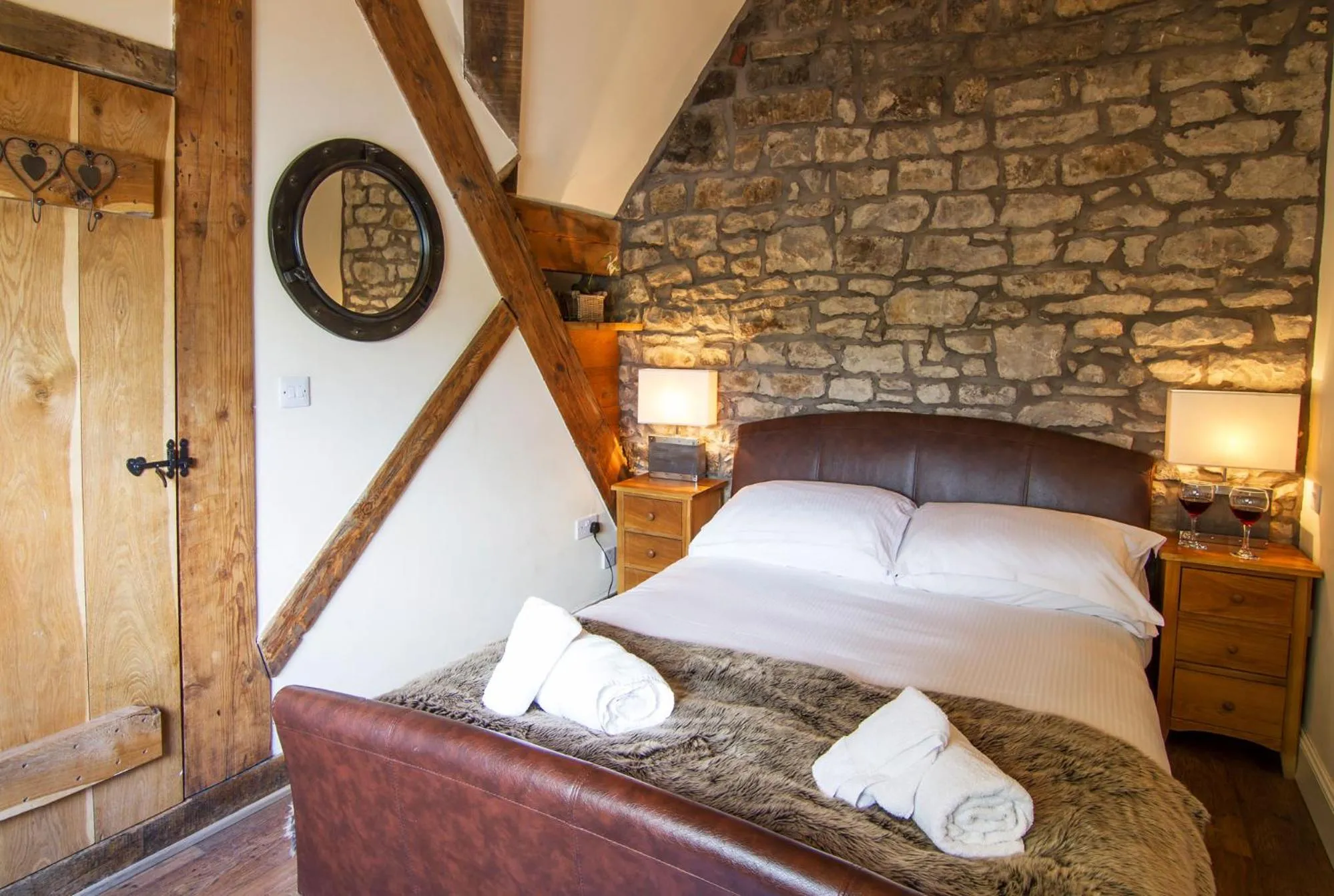 Bed in Romneys Apartments & Suites