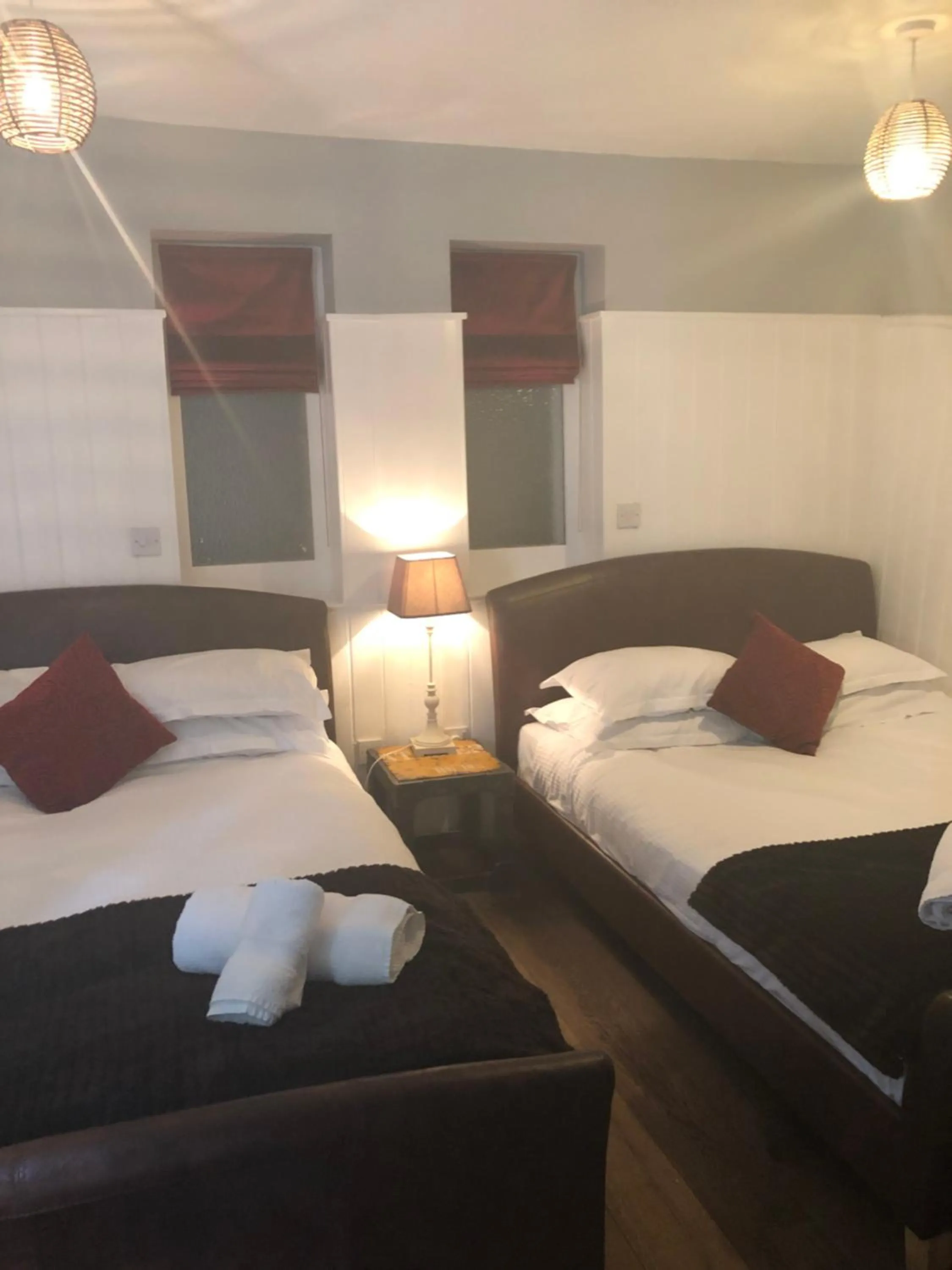Bedroom, Bed in Romneys Apartments & Suites