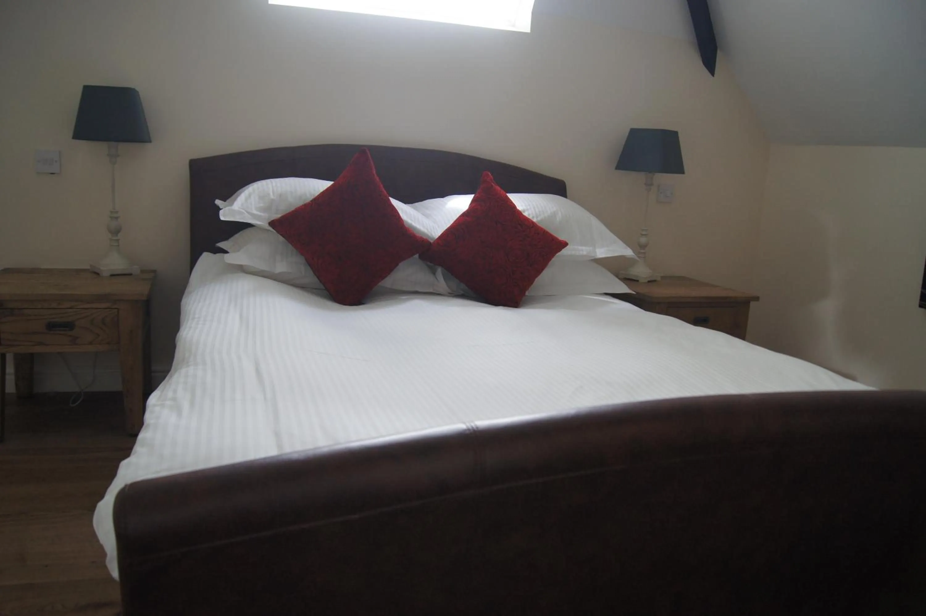 Bedroom, Bed in Romneys Apartments & Suites