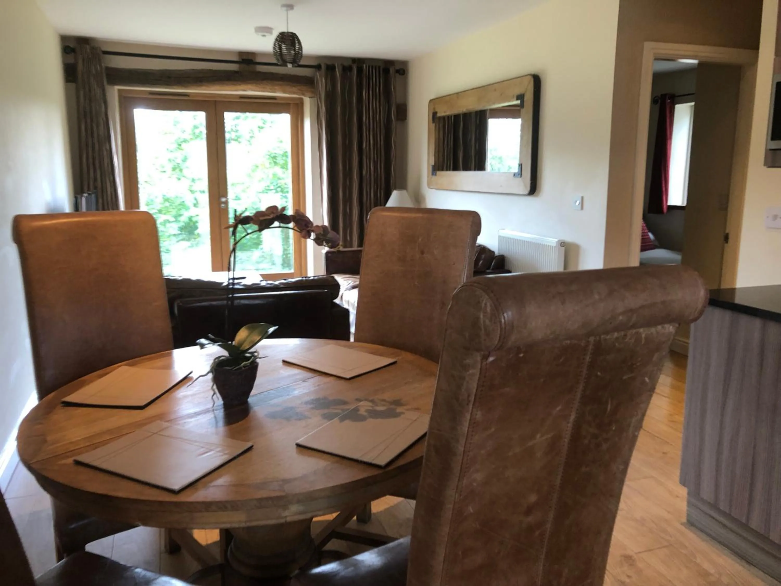 Seating area in Romneys Apartments & Suites