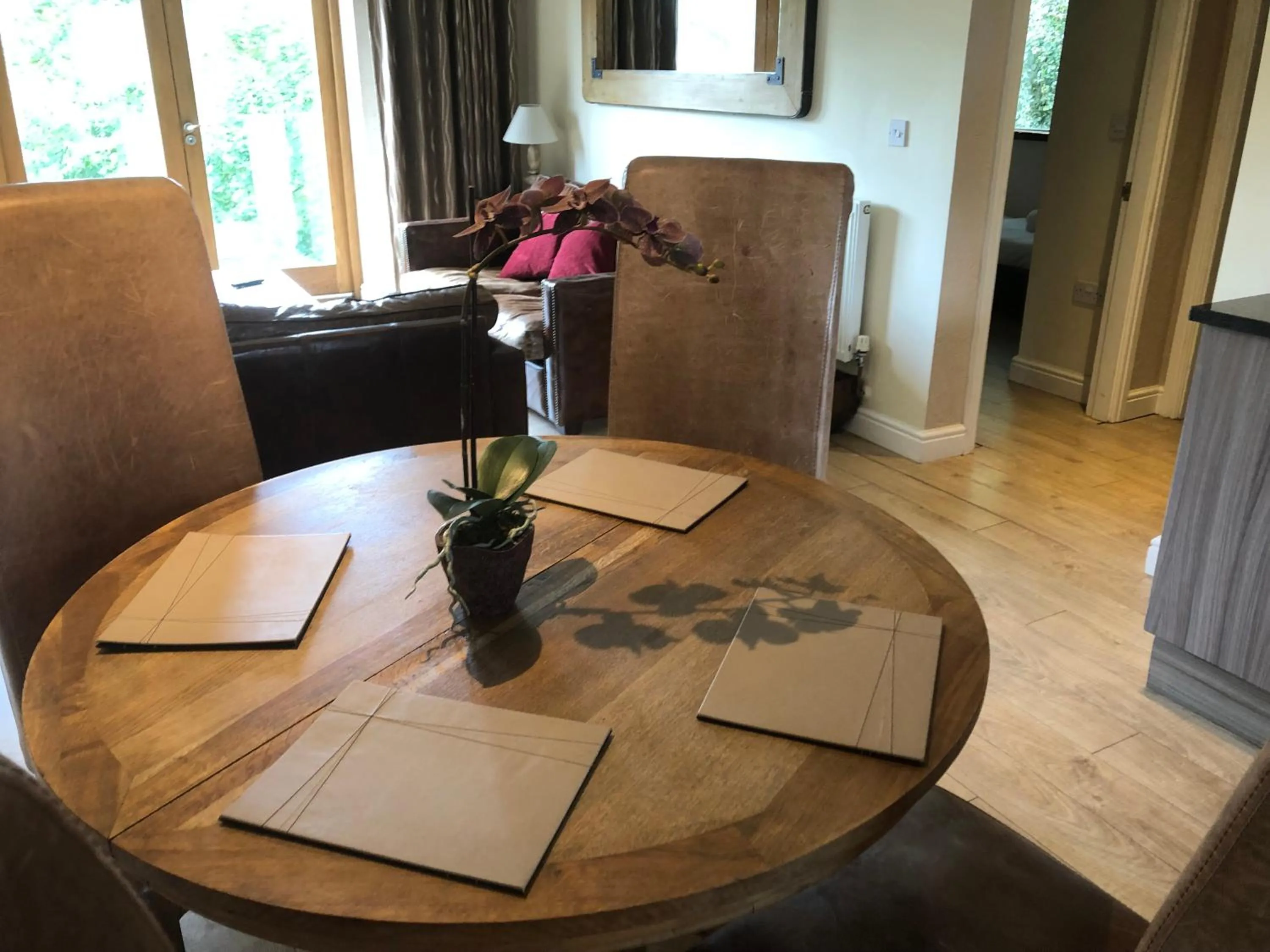 Seating area in Romneys Apartments & Suites