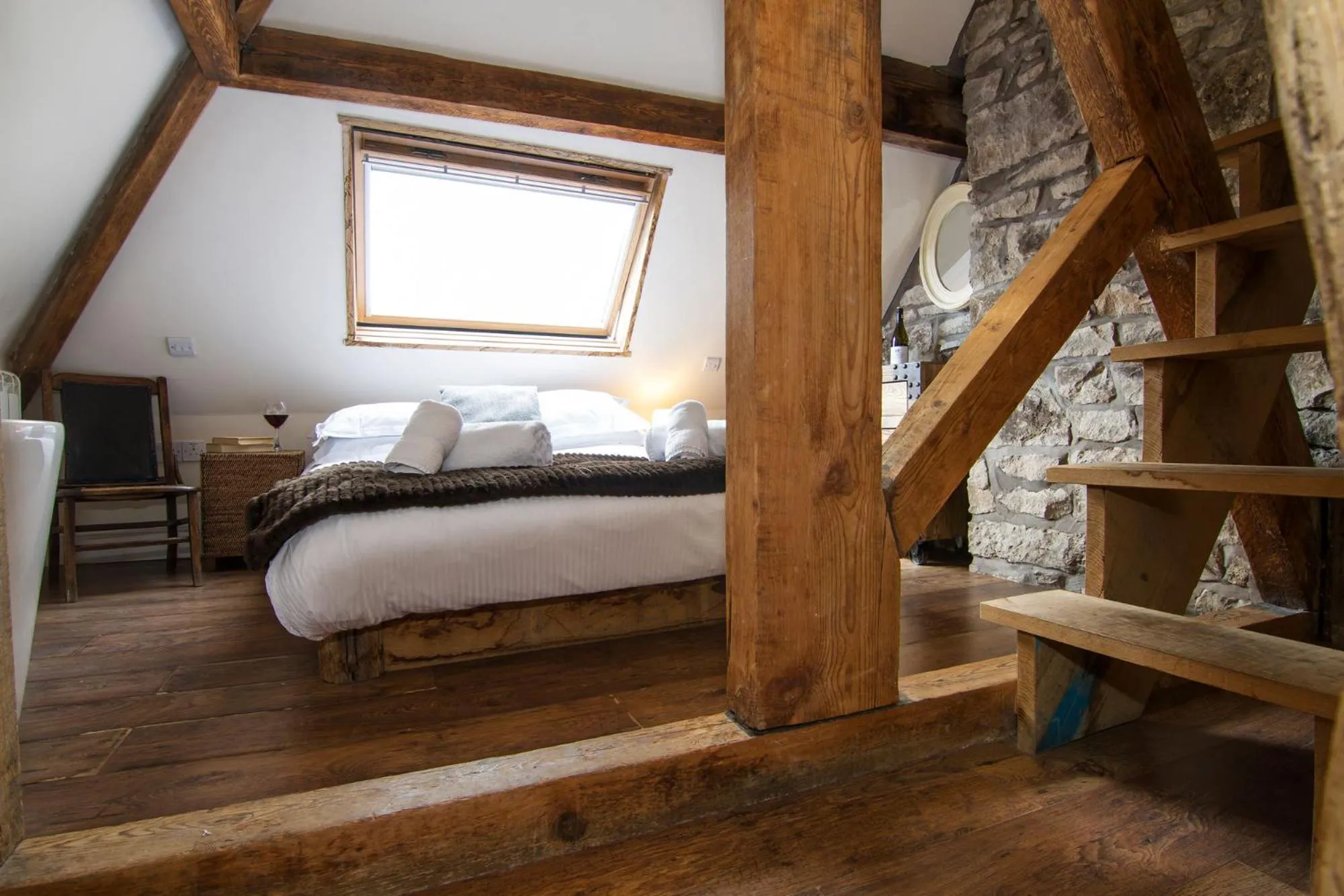 Bed in Romneys Apartments & Suites