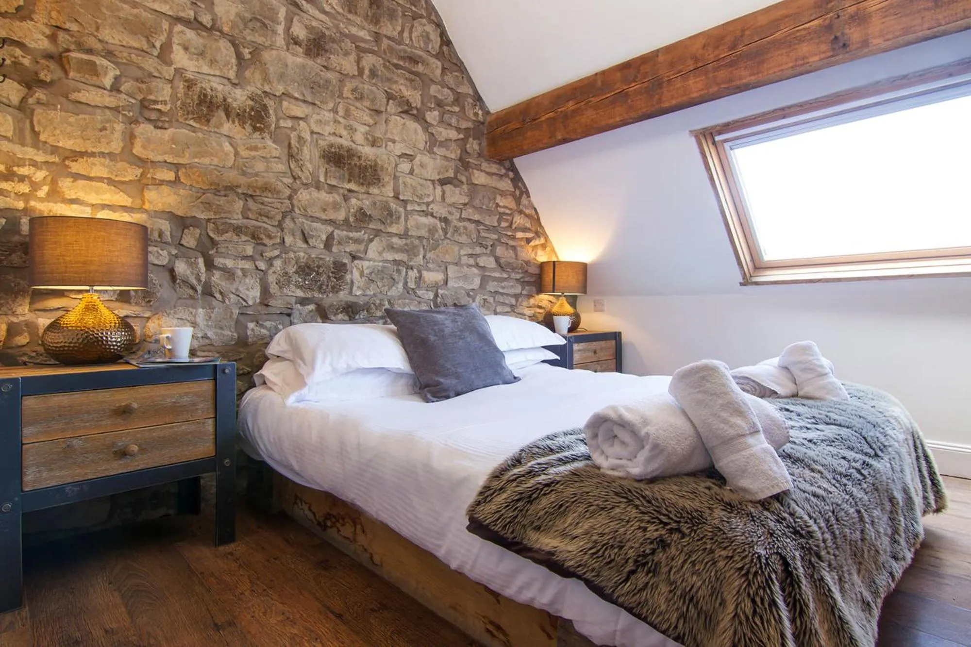 Bed in Romneys Apartments & Suites