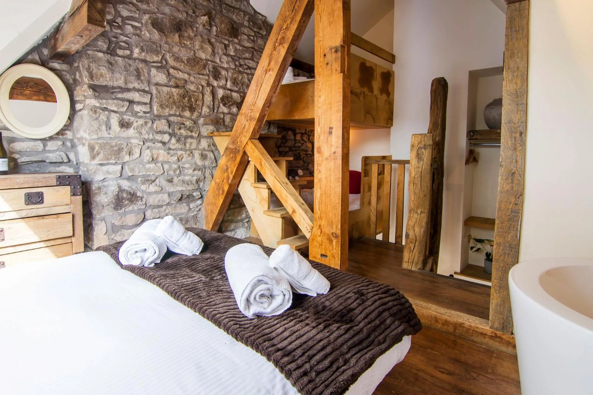Bed in Romneys Apartments & Suites