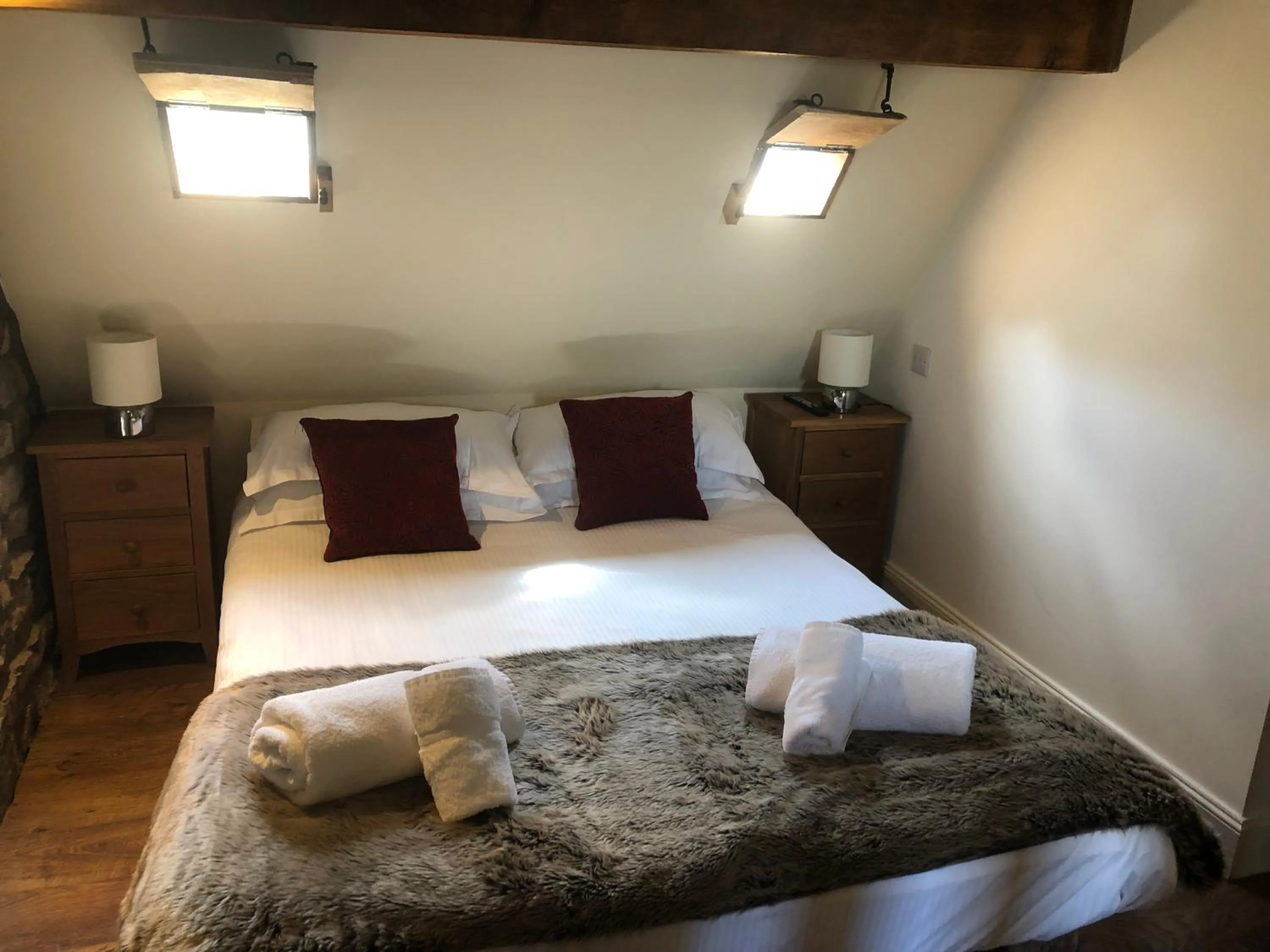 Bedroom, Bed in Romneys Apartments & Suites