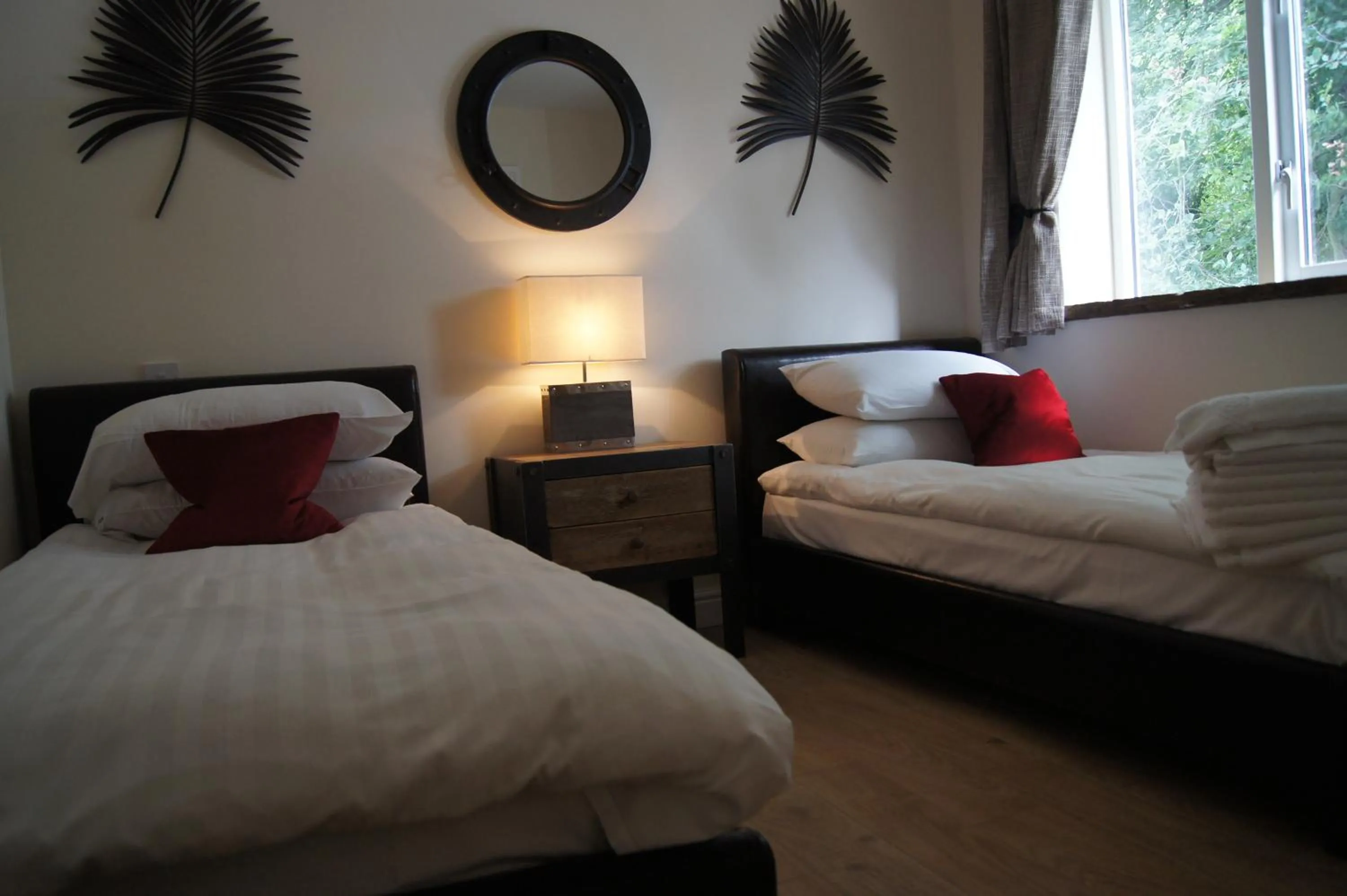 Bedroom, Bed in Romneys Apartments & Suites