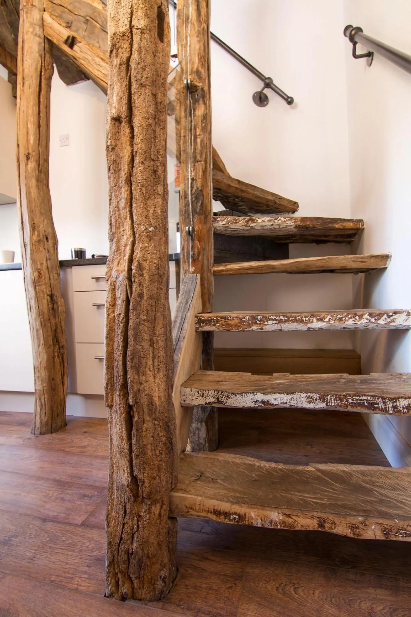 Kitchen or kitchenette in Romneys Apartments & Suites