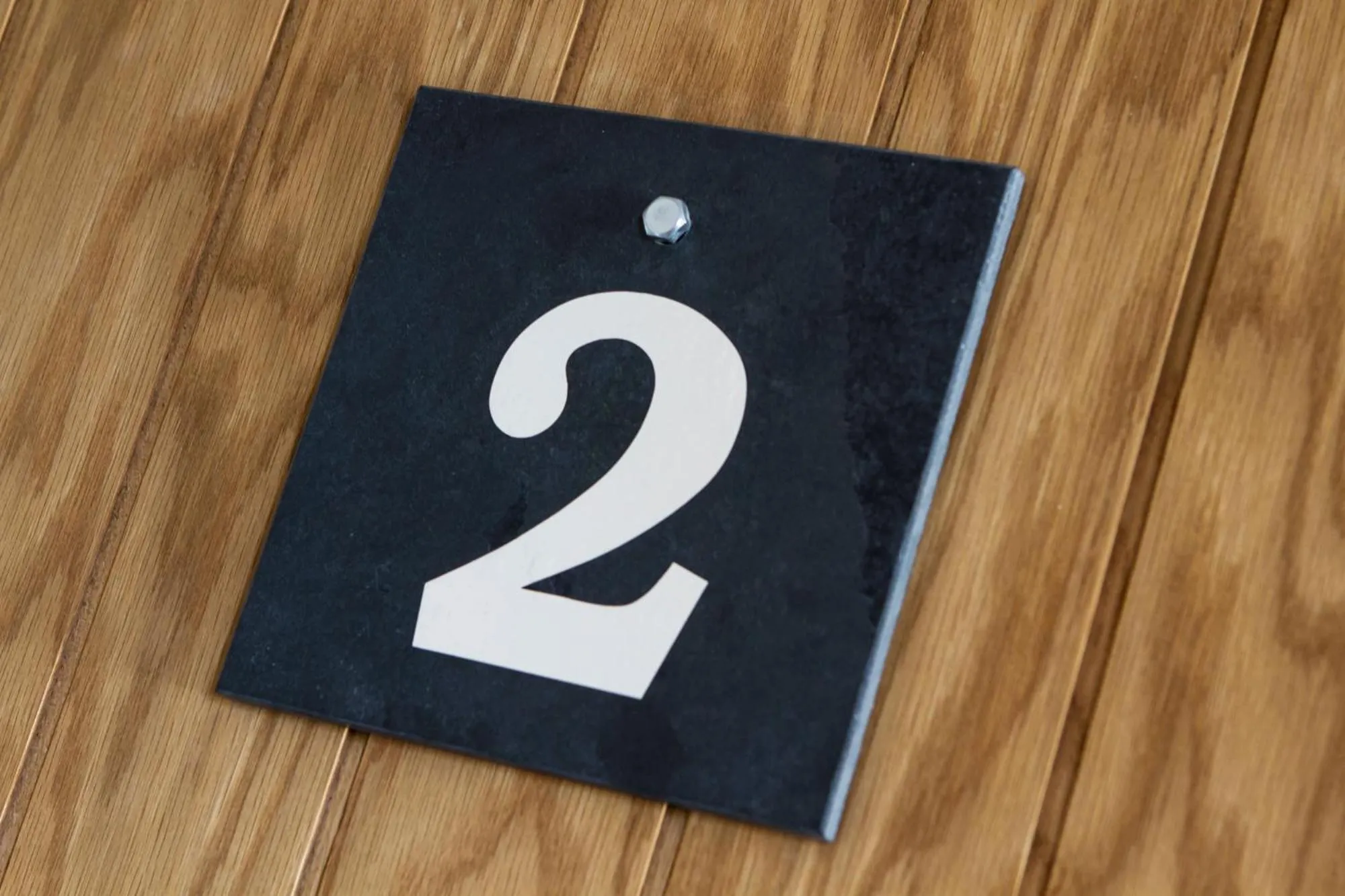 Logo/Certificate/Sign in Romneys Apartments & Suites