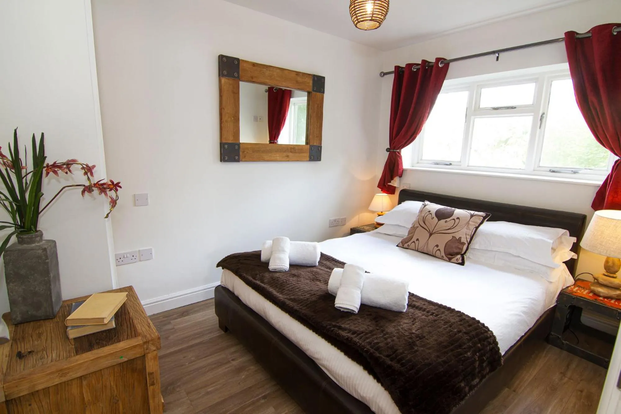 Bed in Romneys Apartments & Suites