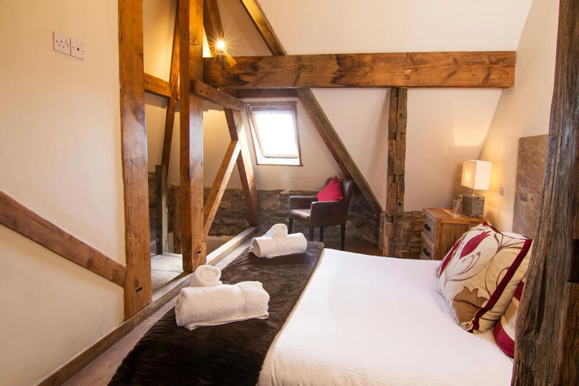 Bed in Romneys Apartments & Suites