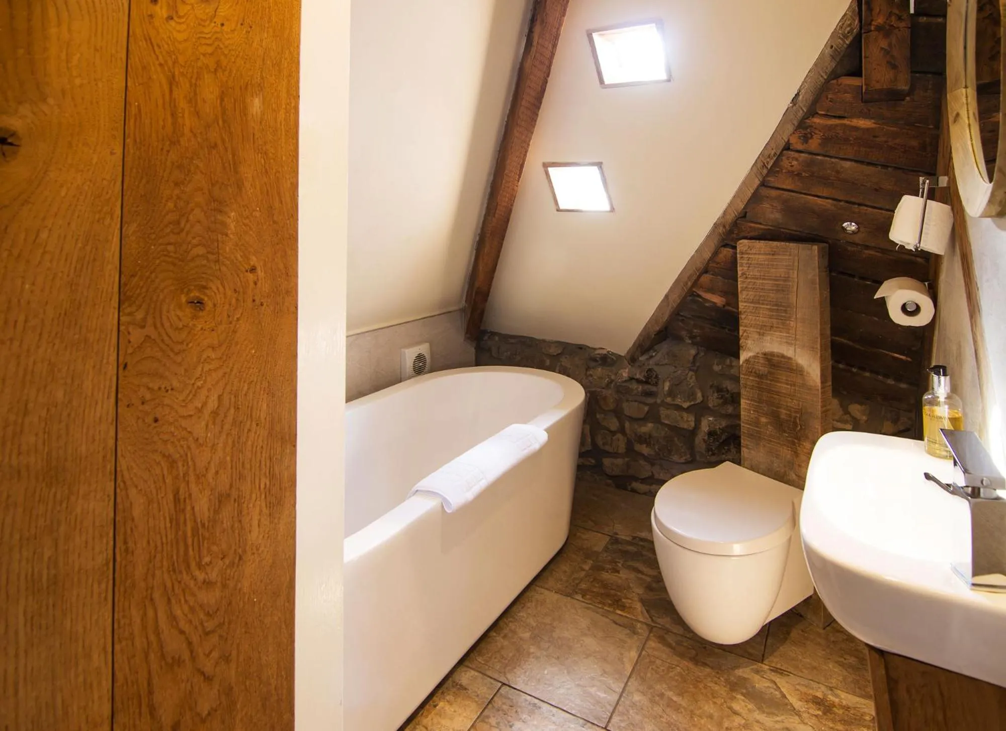 Bathroom in Romneys Apartments & Suites