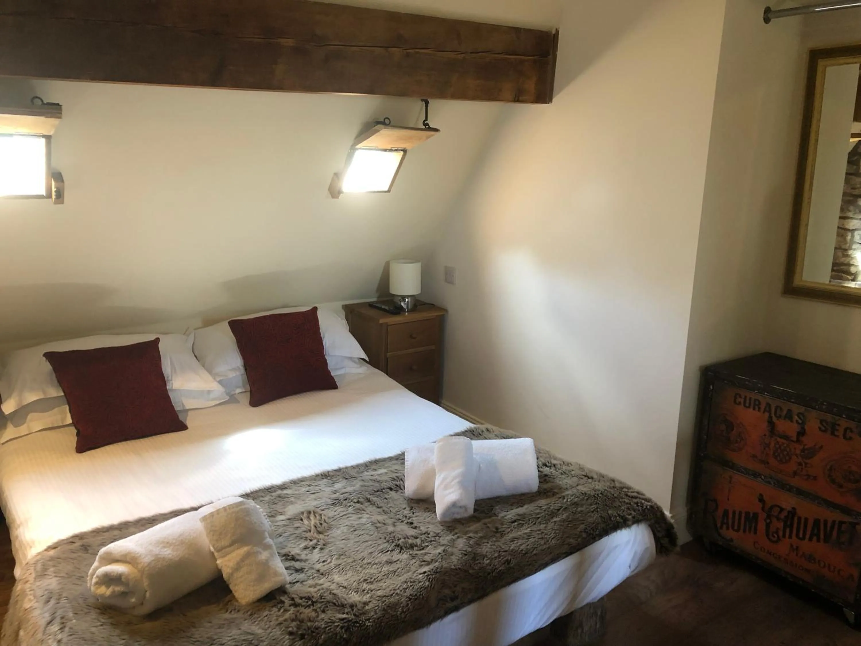 Bedroom, Bed in Romneys Apartments & Suites