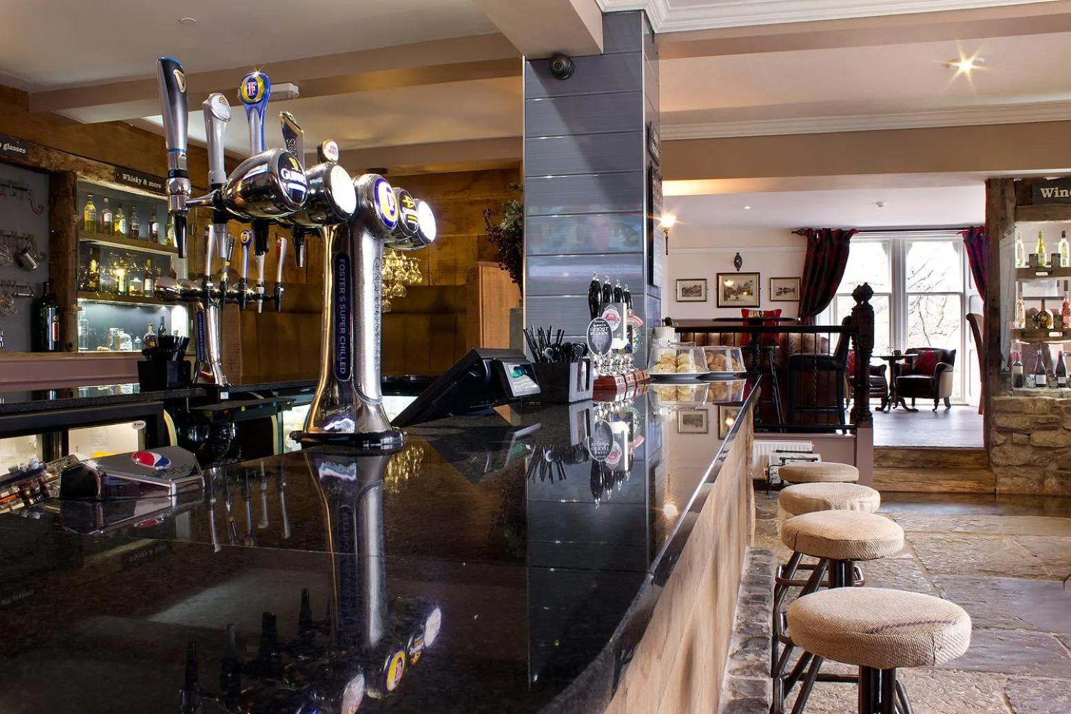 Lounge or bar in Romneys Apartments & Suites
