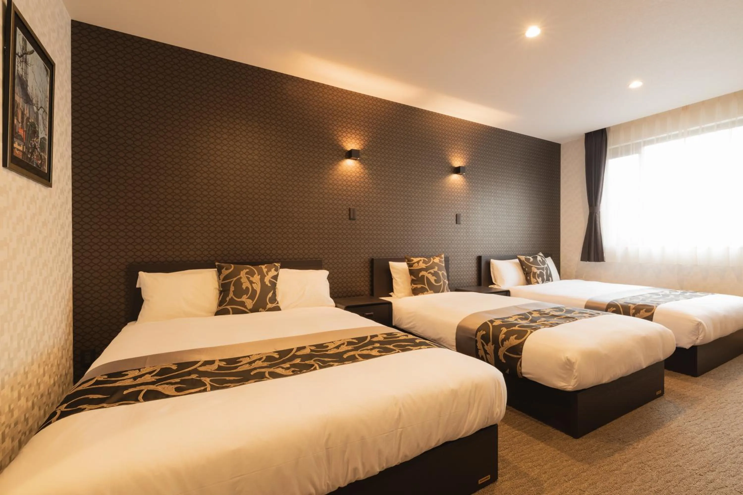 Bed in GRAND BASE Nagasaki Ekimae