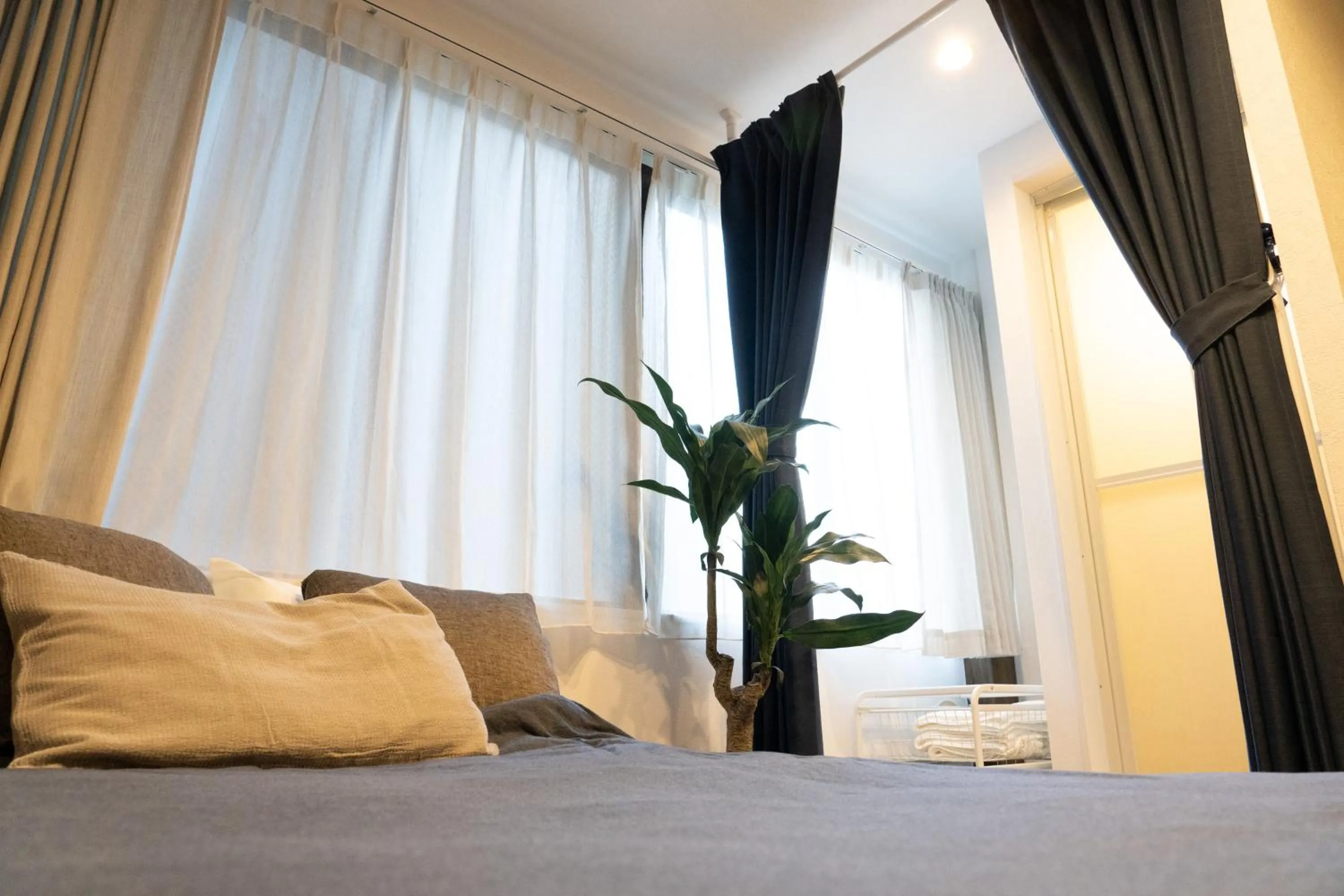 Bed in Higashi Shinagawa Apartment by Tranova