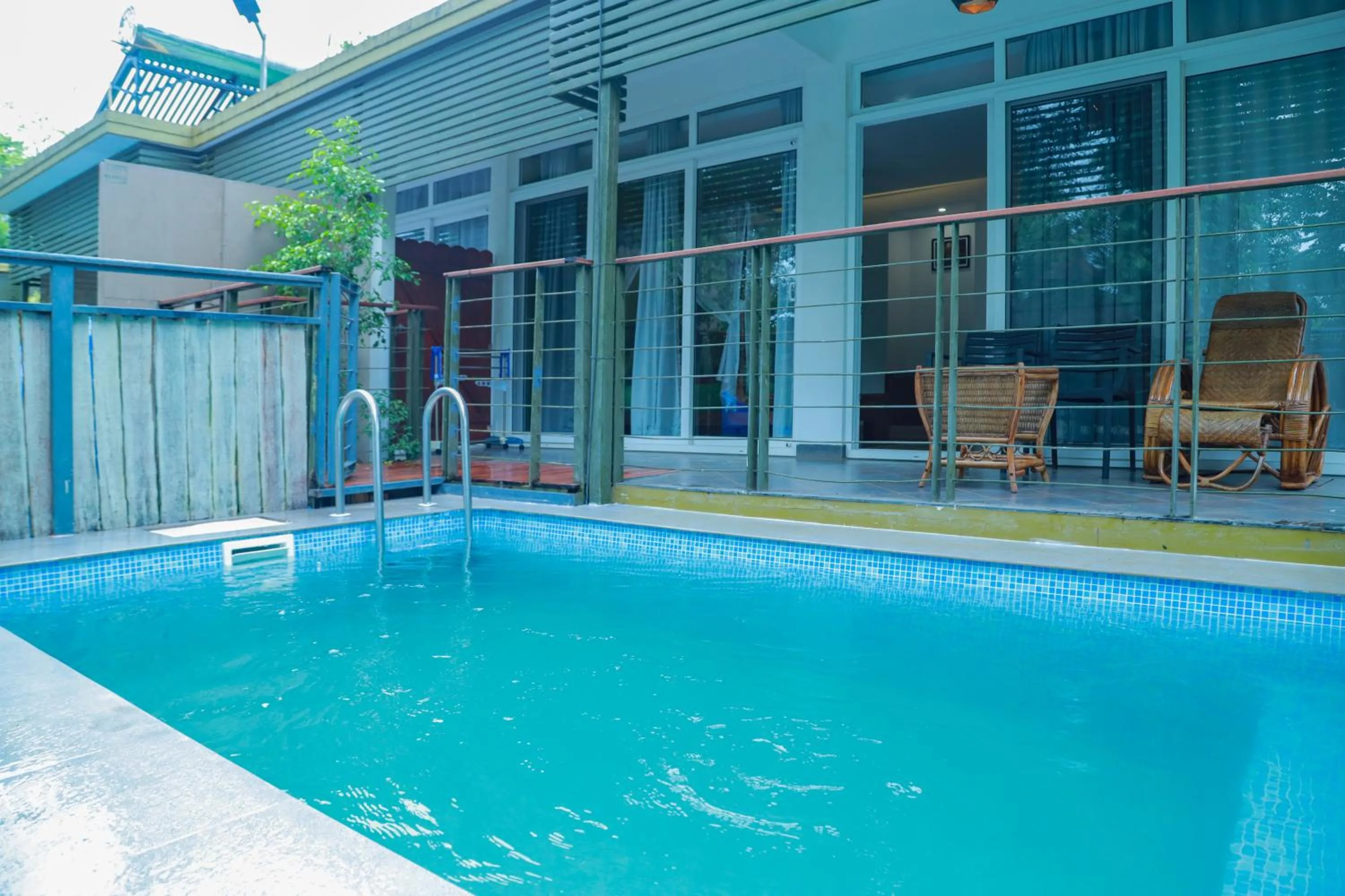 Swimming pool in Kuruva Island Resort And Spa - By KABINI BREEZE