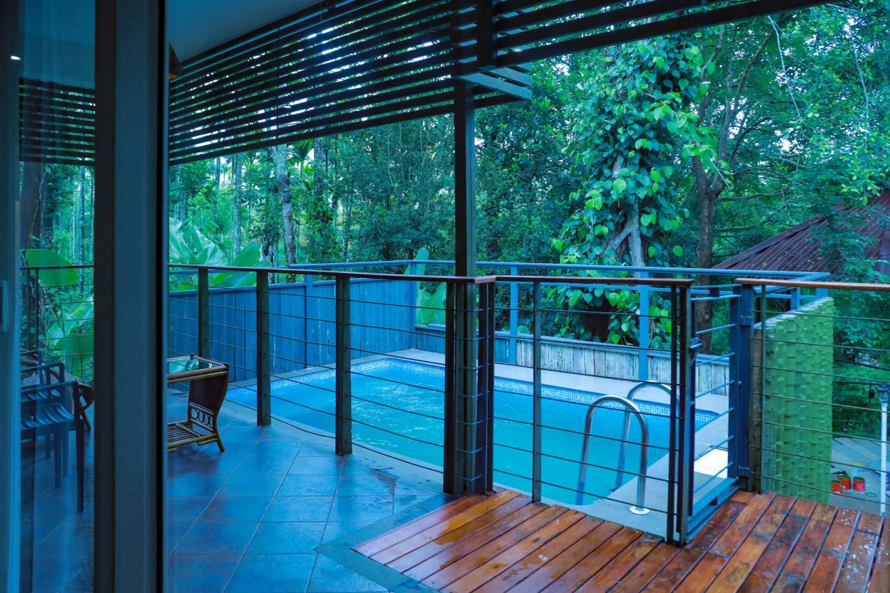 Pool view in Kuruva Island Resort And Spa - By KABINI BREEZE Pool view in Kuruva Island Resort And Spa - By KABINI BREEZE