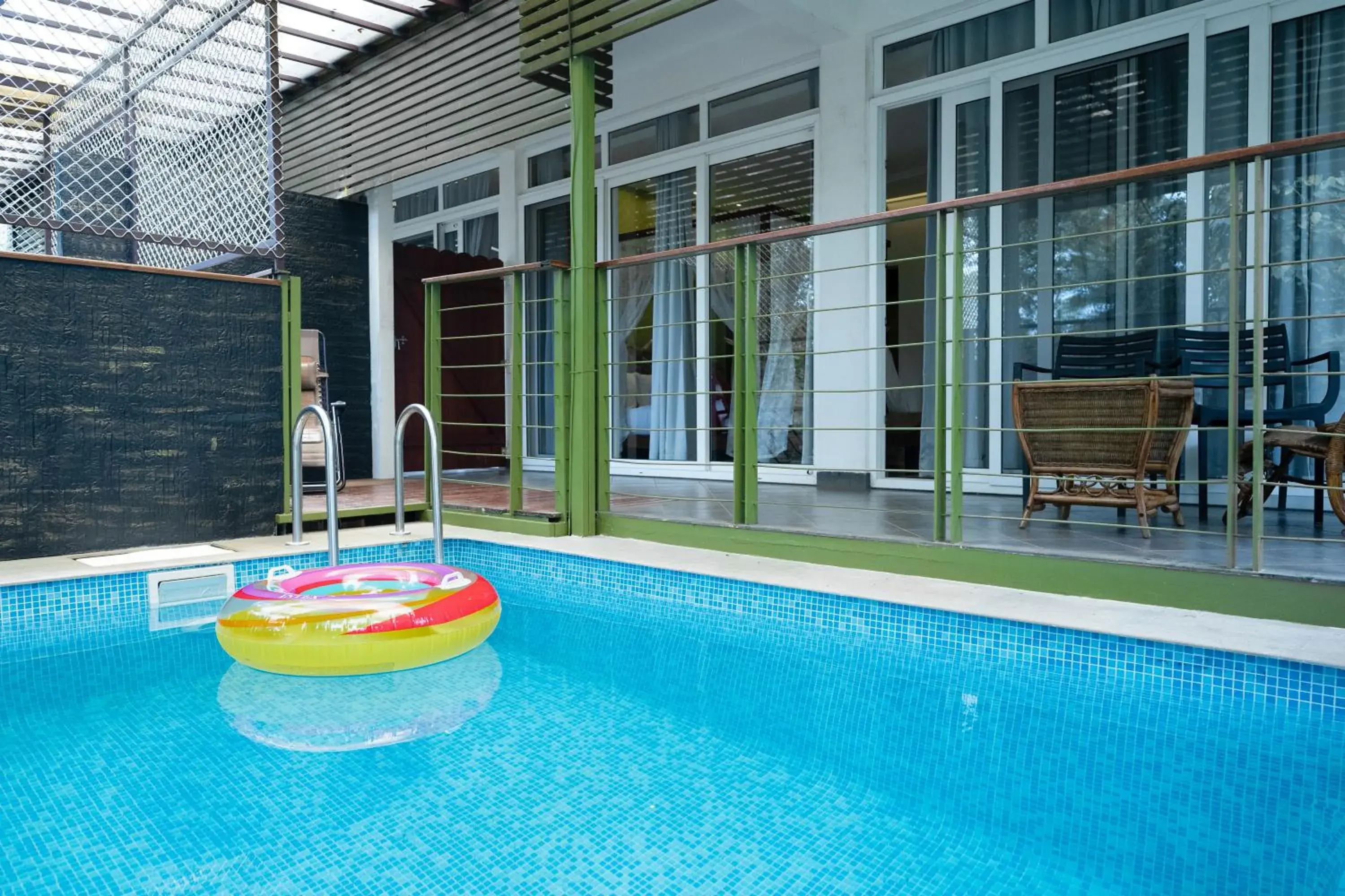 Swimming pool in Kuruva Island Resort And Spa - By KABINI BREEZE Swimming pool in Kuruva Island Resort And Spa - By KABINI BREEZE