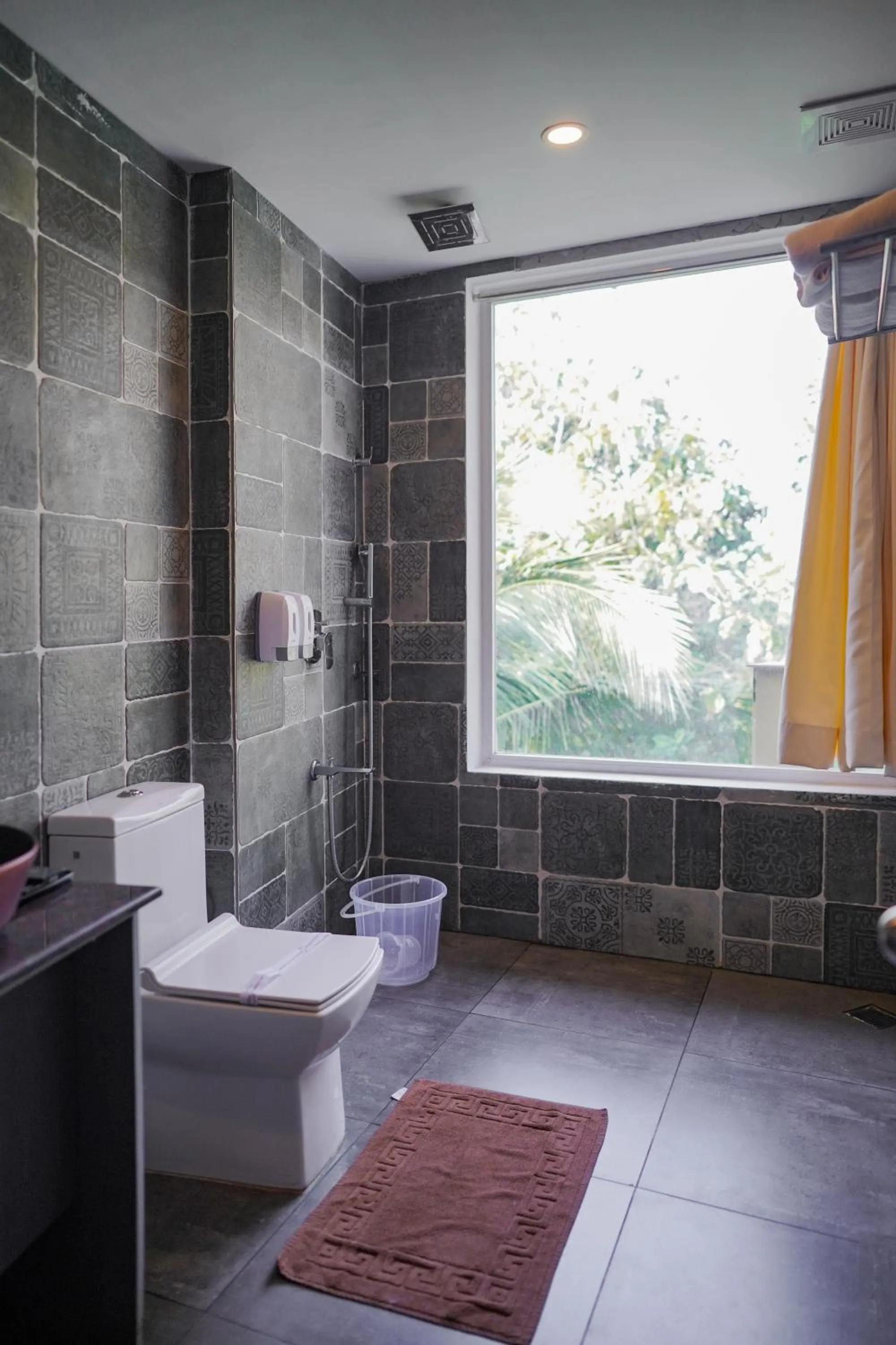 Bathroom in Kuruva Island Resort And Spa - By KABINI BREEZE