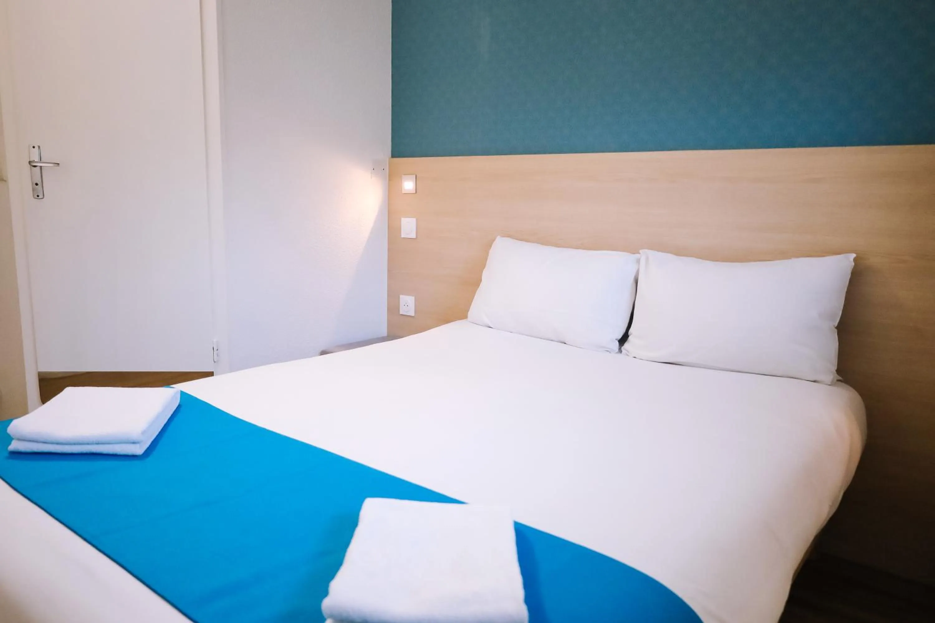 Bed in Kyriad Direct Chilly-Mazarin