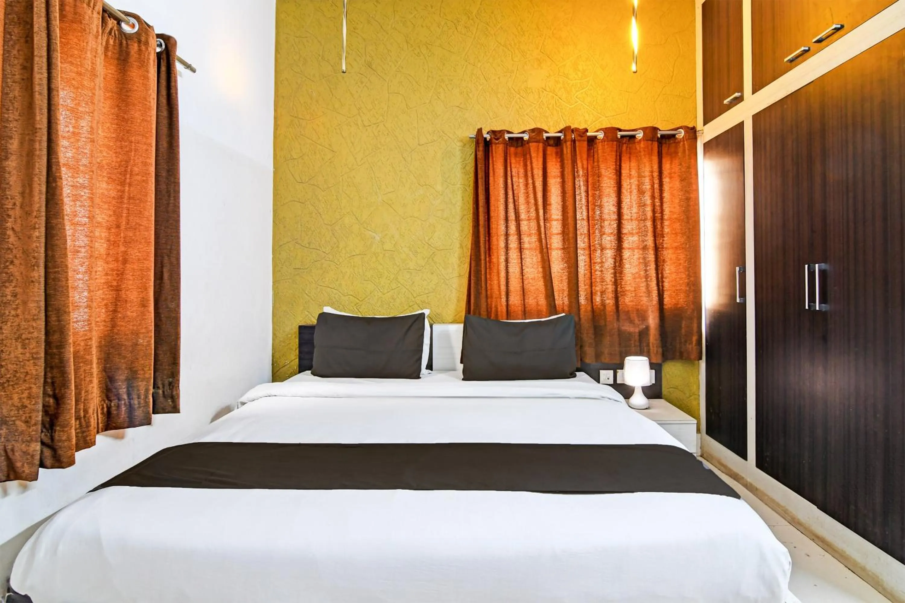 Bedroom in Hotel O Home Bm-x