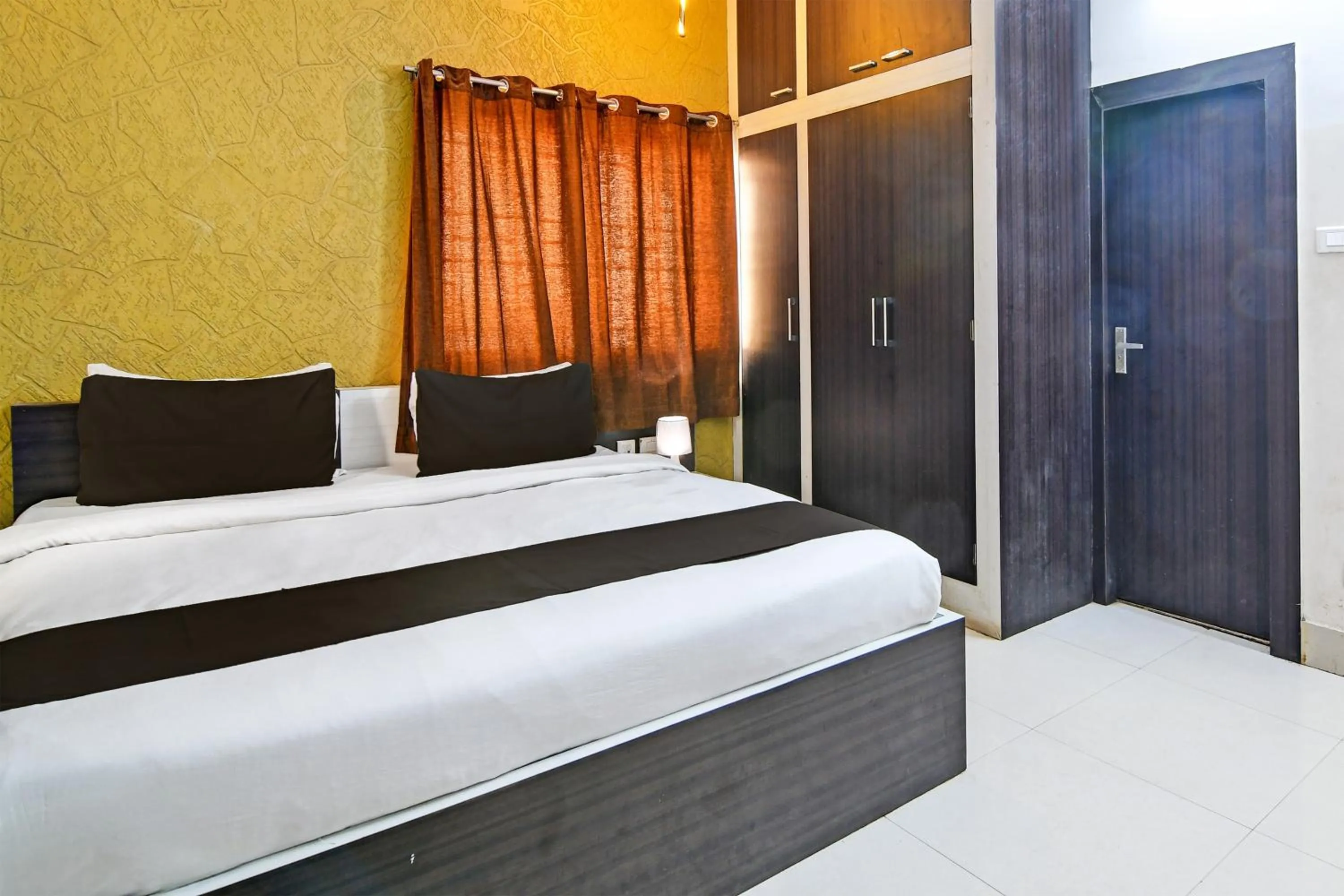 Bedroom in Hotel O Home Bm-x