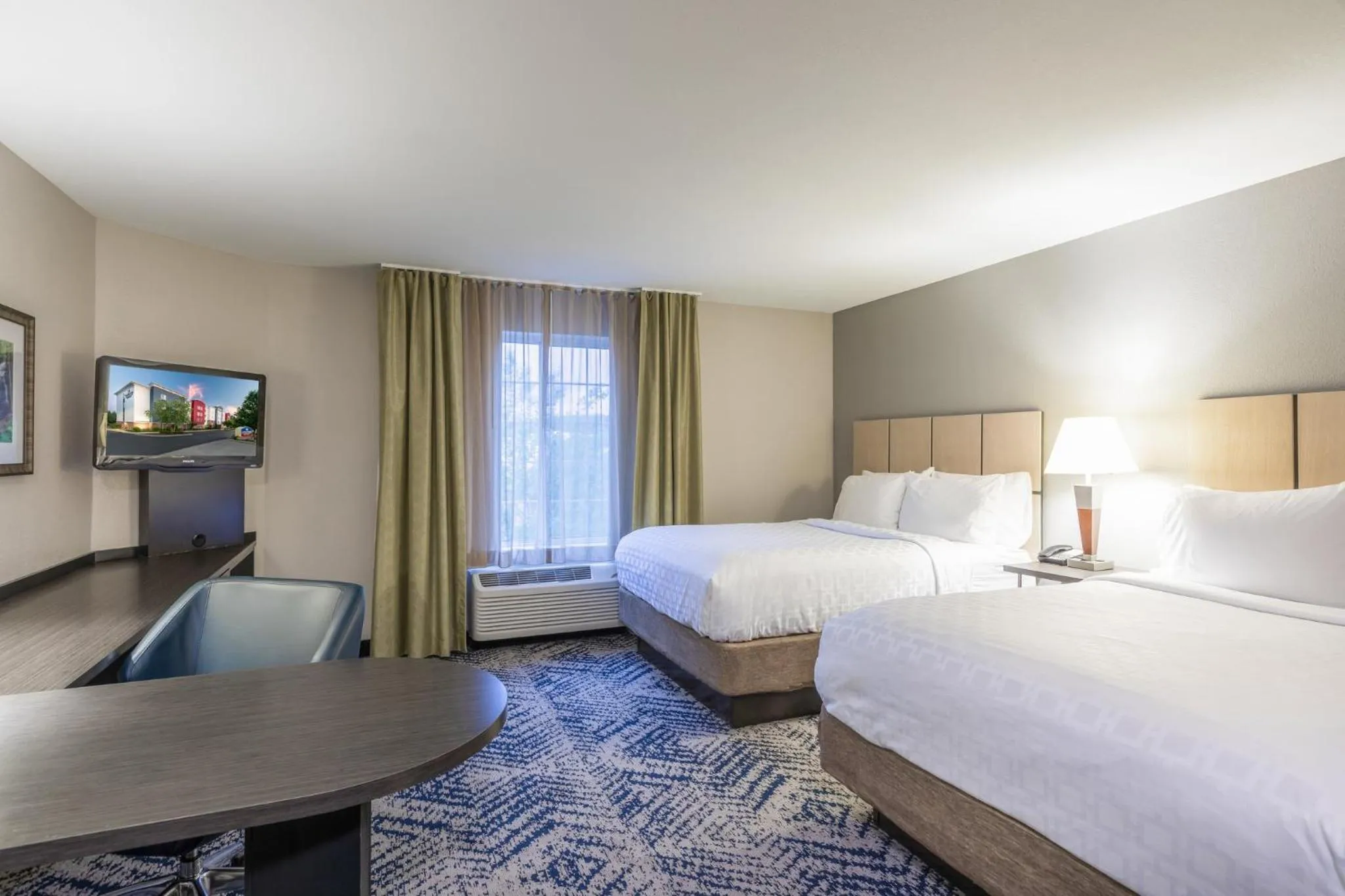 Photo of the whole room, Bed in Candlewood Suites Greenville by IHG