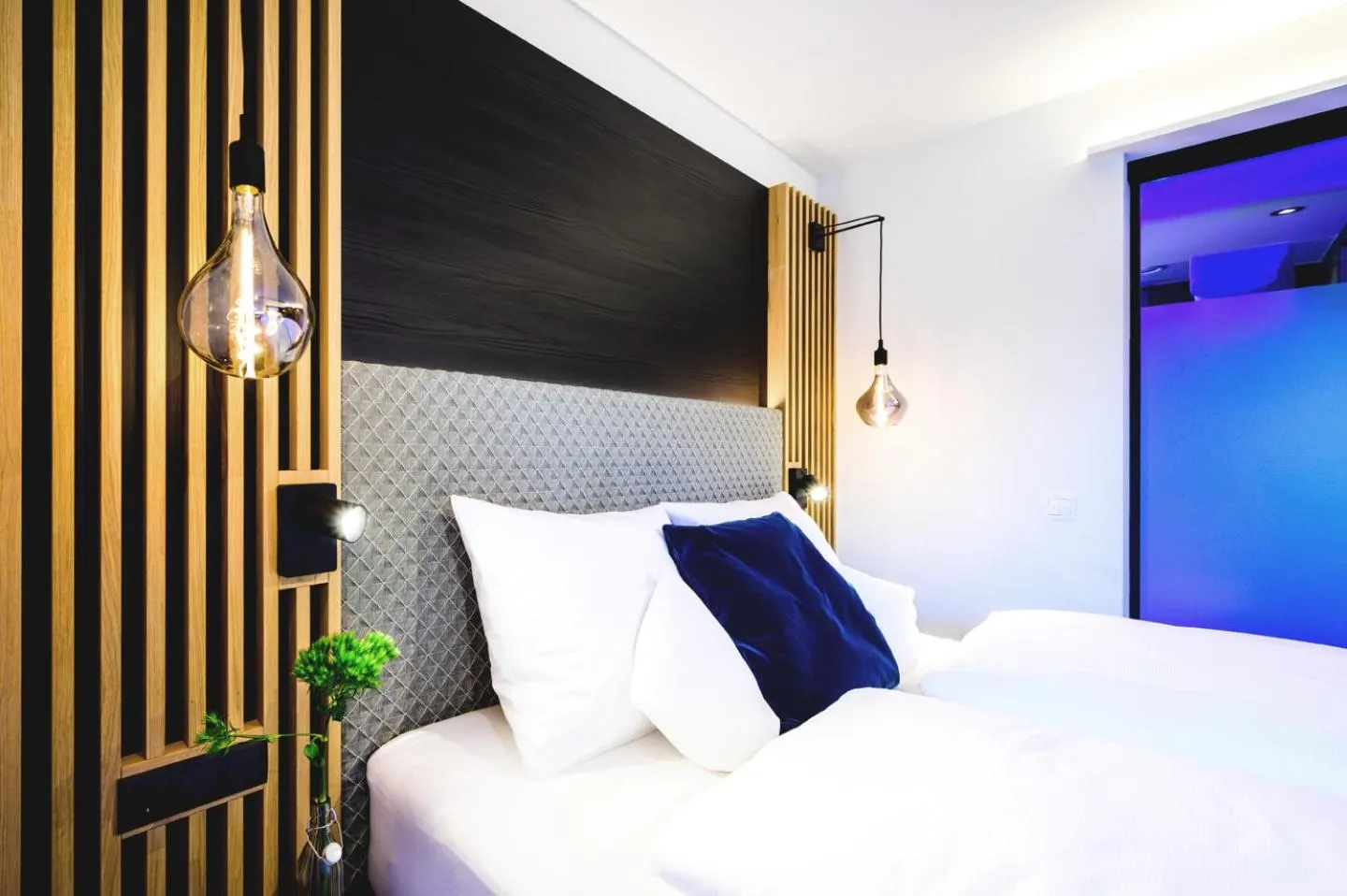 Bed in Aqua Blu Hotel