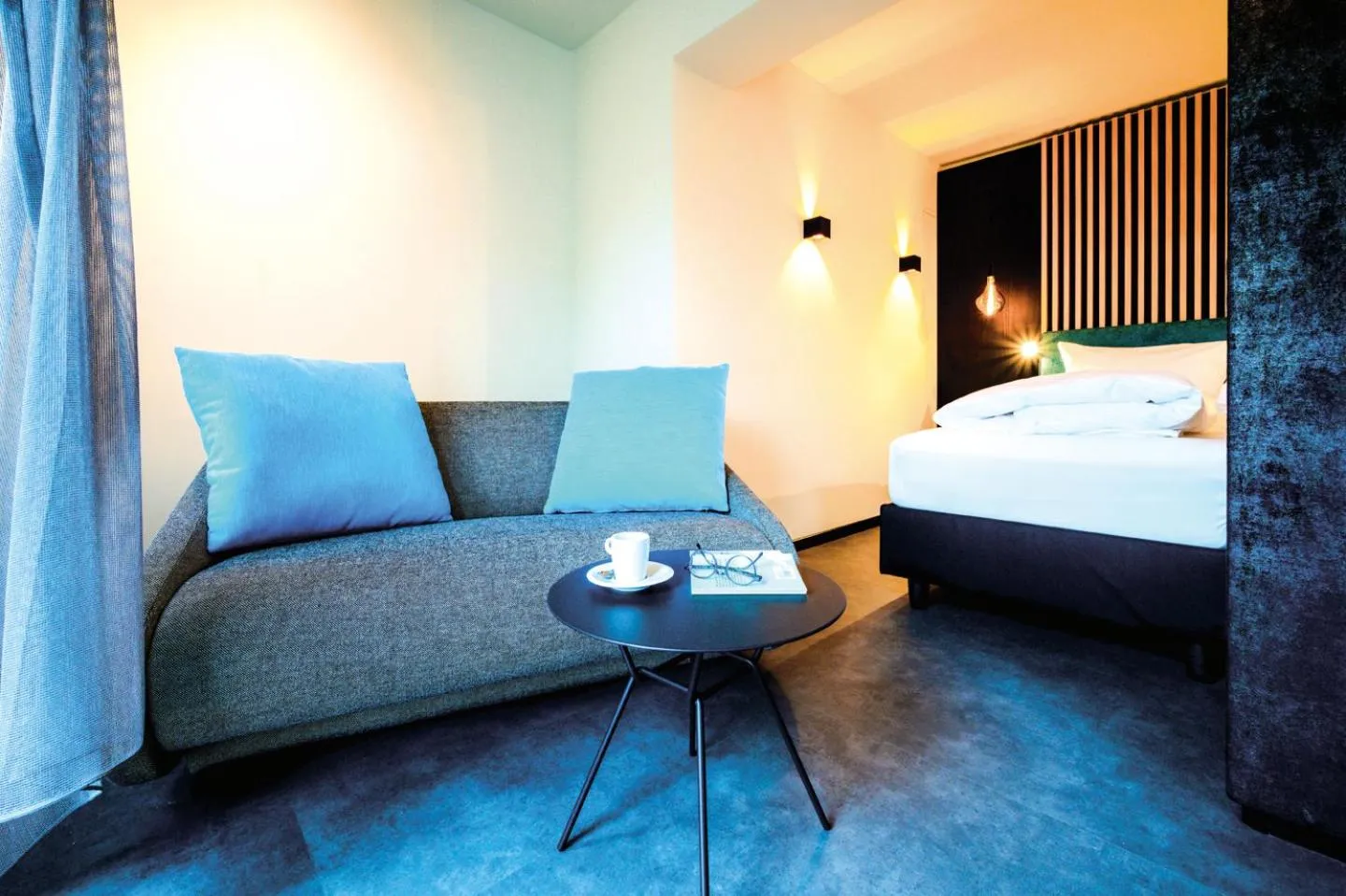 Bed in Aqua Blu Hotel