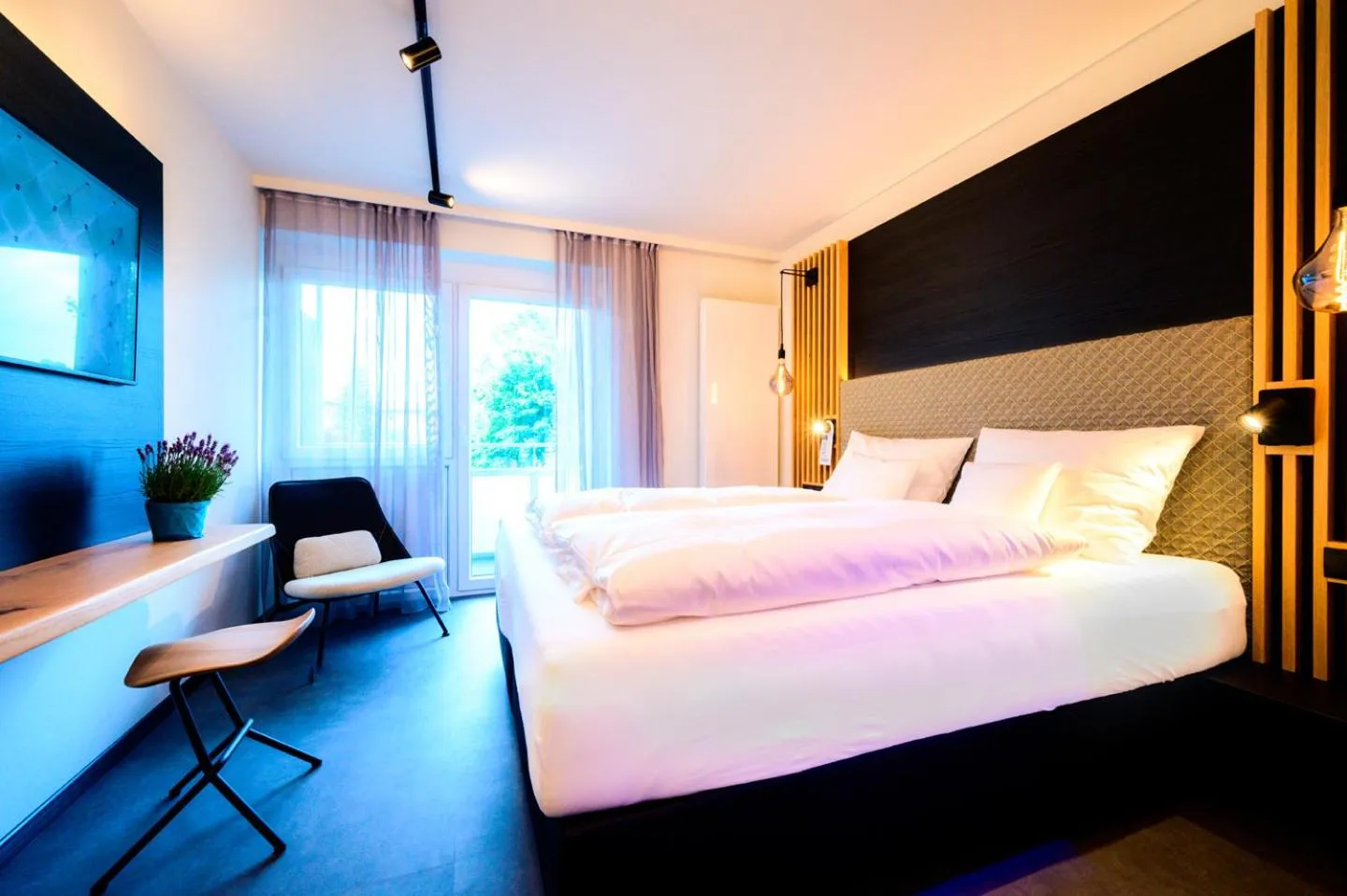 Bed in Aqua Blu Hotel