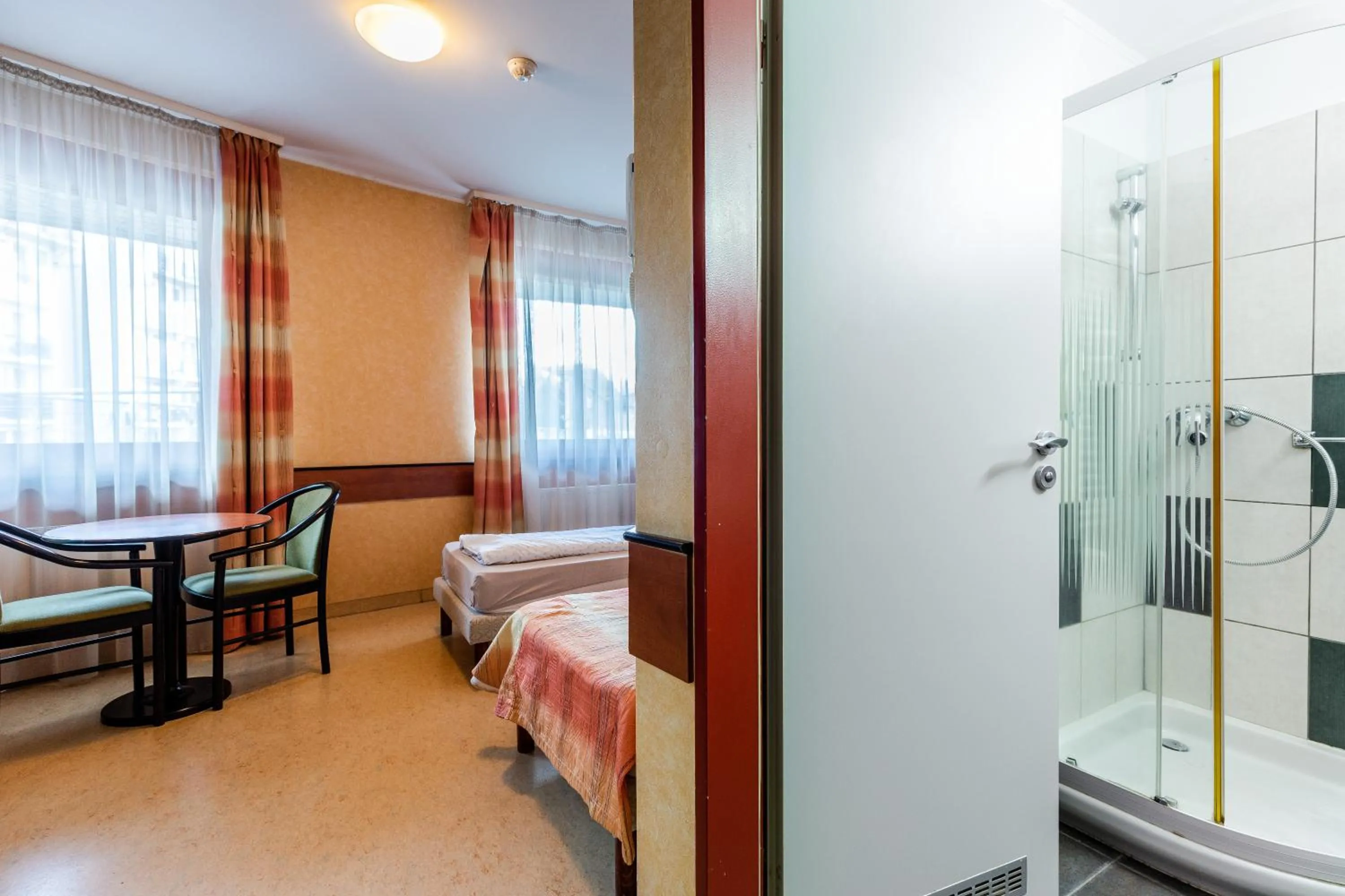 Bed in Corner Motel