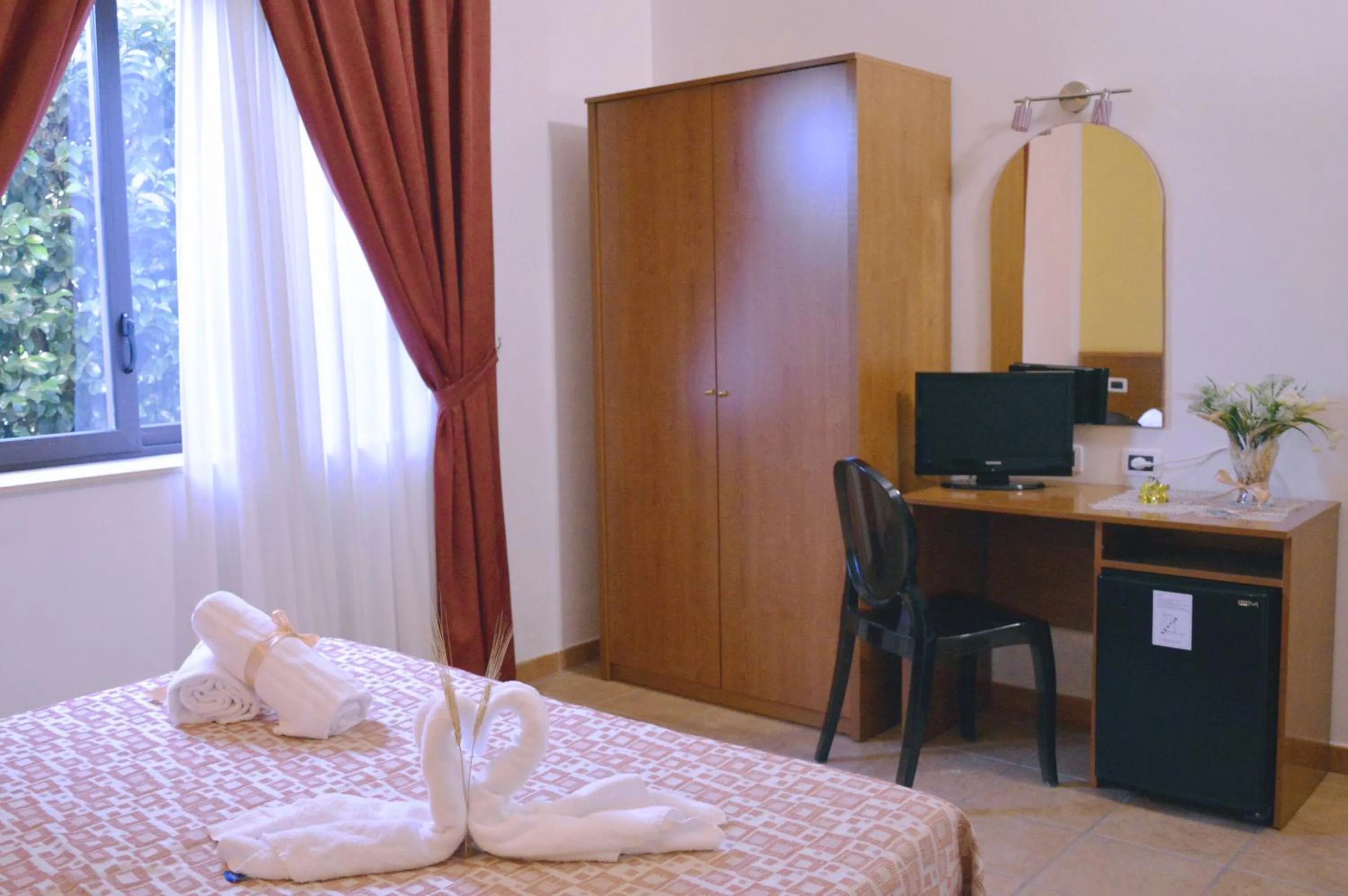 Photo of the whole room, Bed in Desusino Residence & Hotel