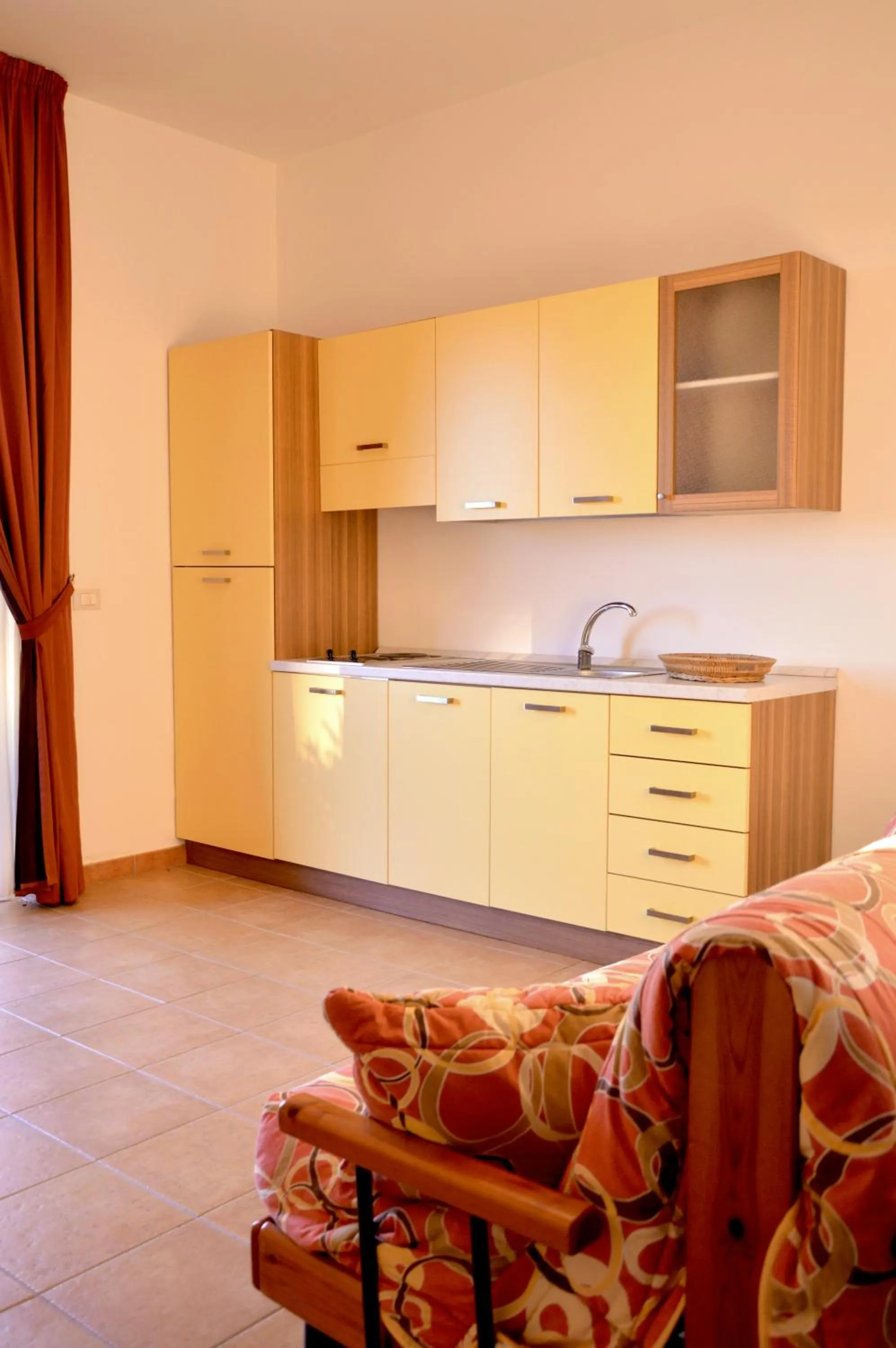 Kitchen or kitchenette in Desusino Residence & Hotel
