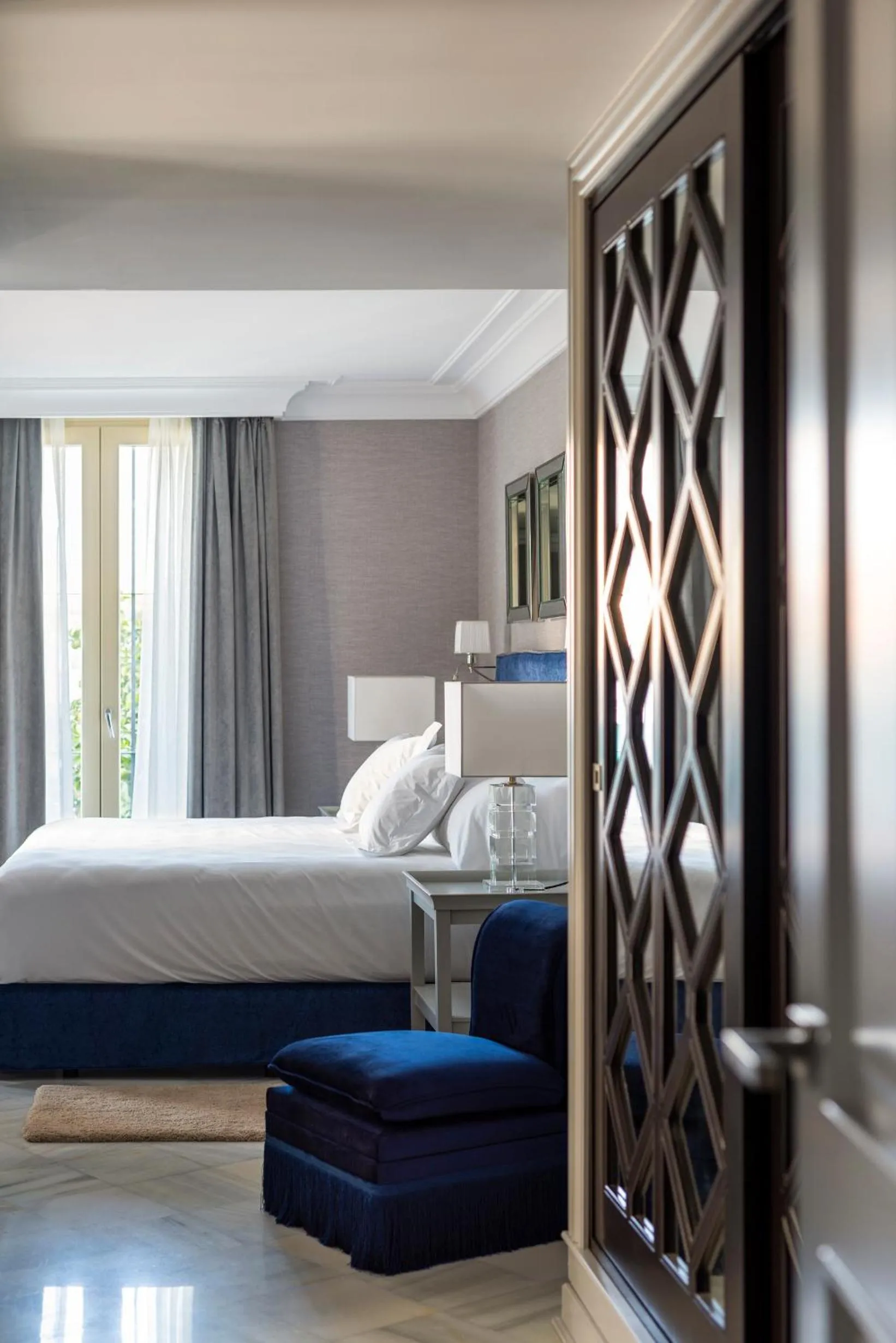 Bed in Casa de Triana Luxury Suites by Casa del Poeta