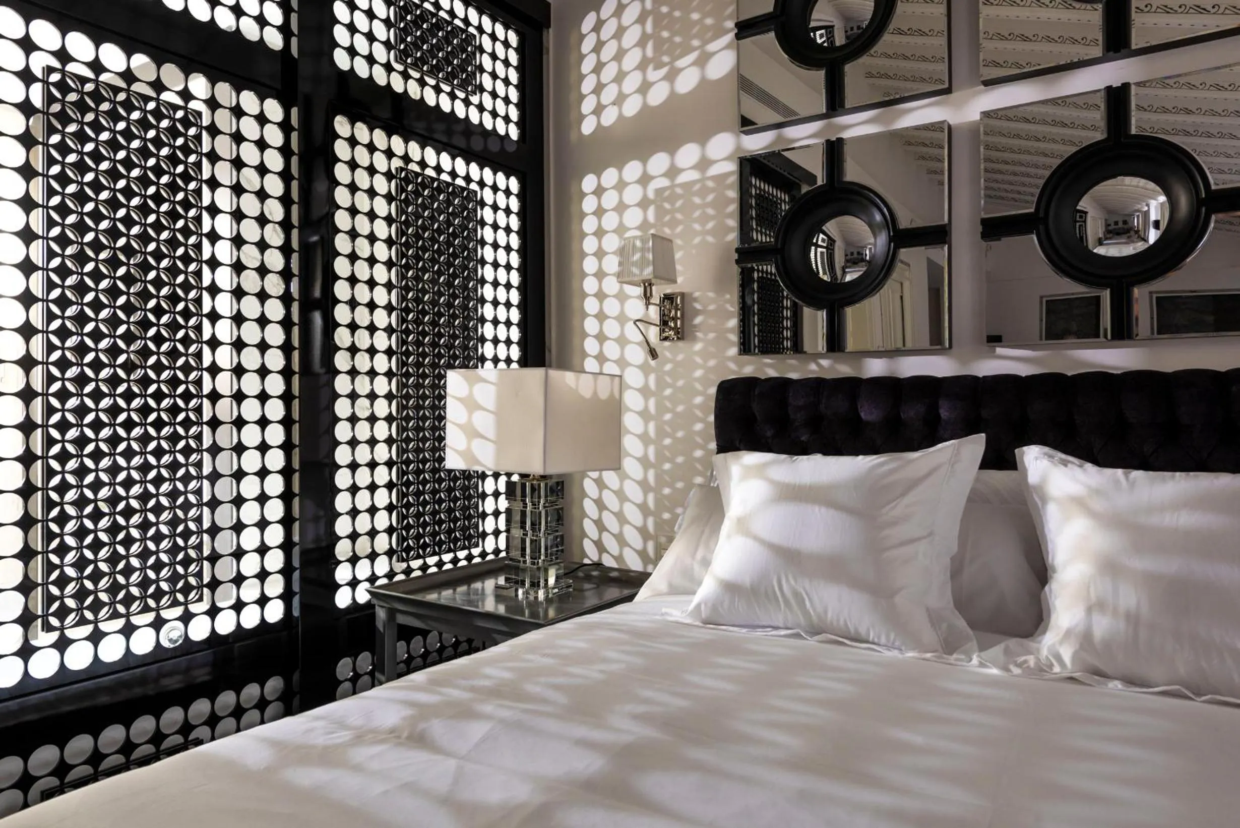 Bed in Casa de Triana Luxury Suites by Casa del Poeta