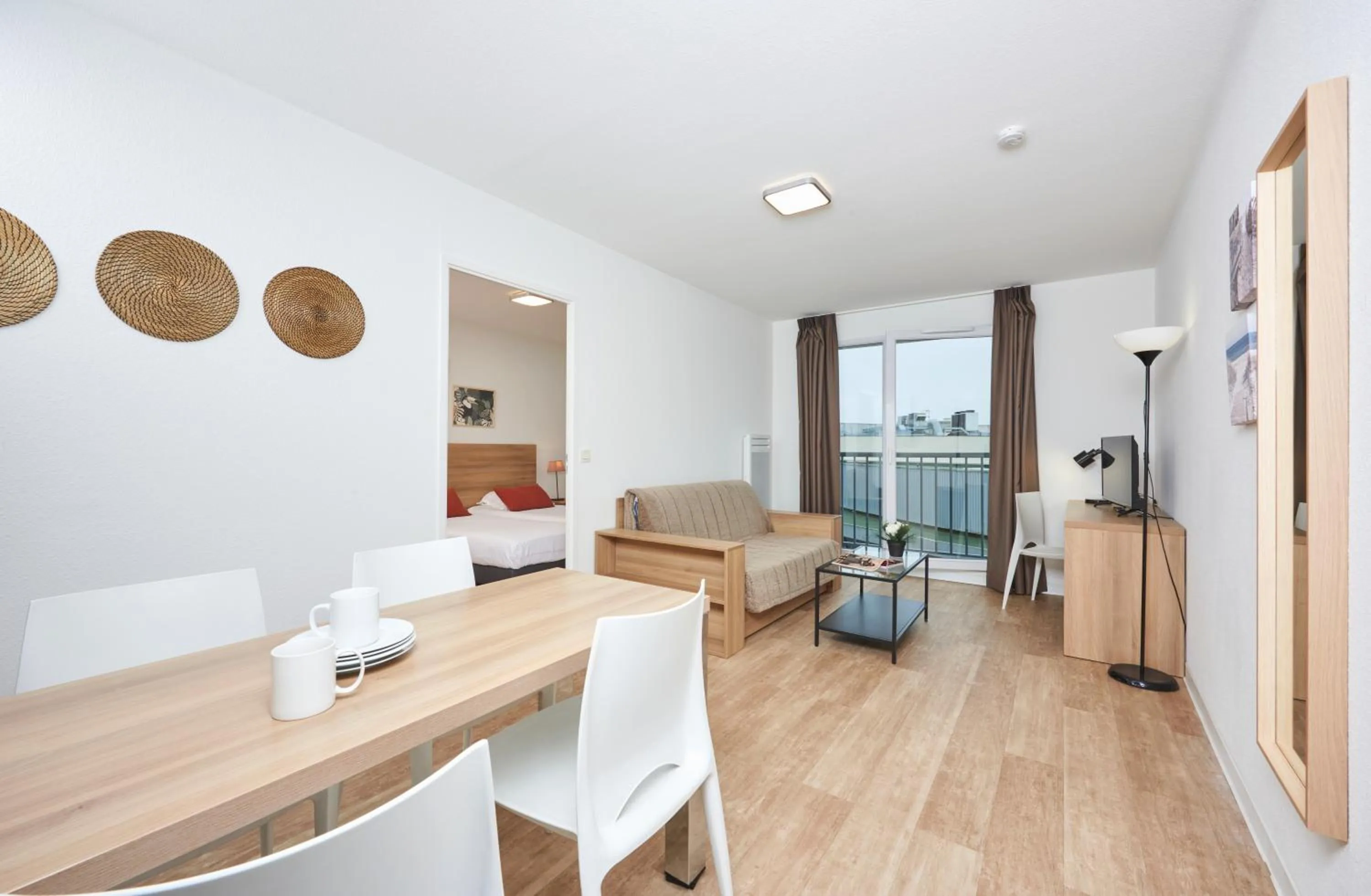 Living room in Ténéo Apparthotel Talence - Centre