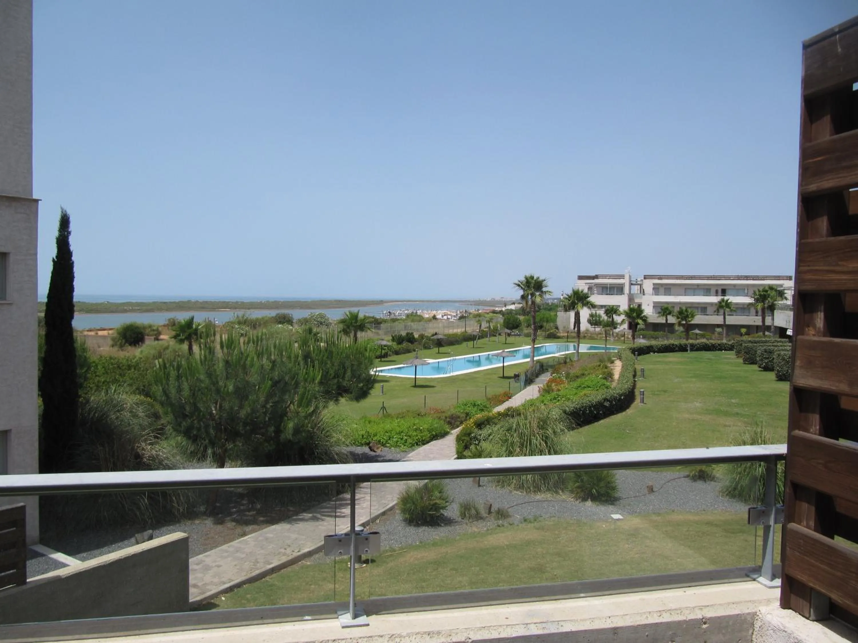 Pool view in Life Apartments El Rompido