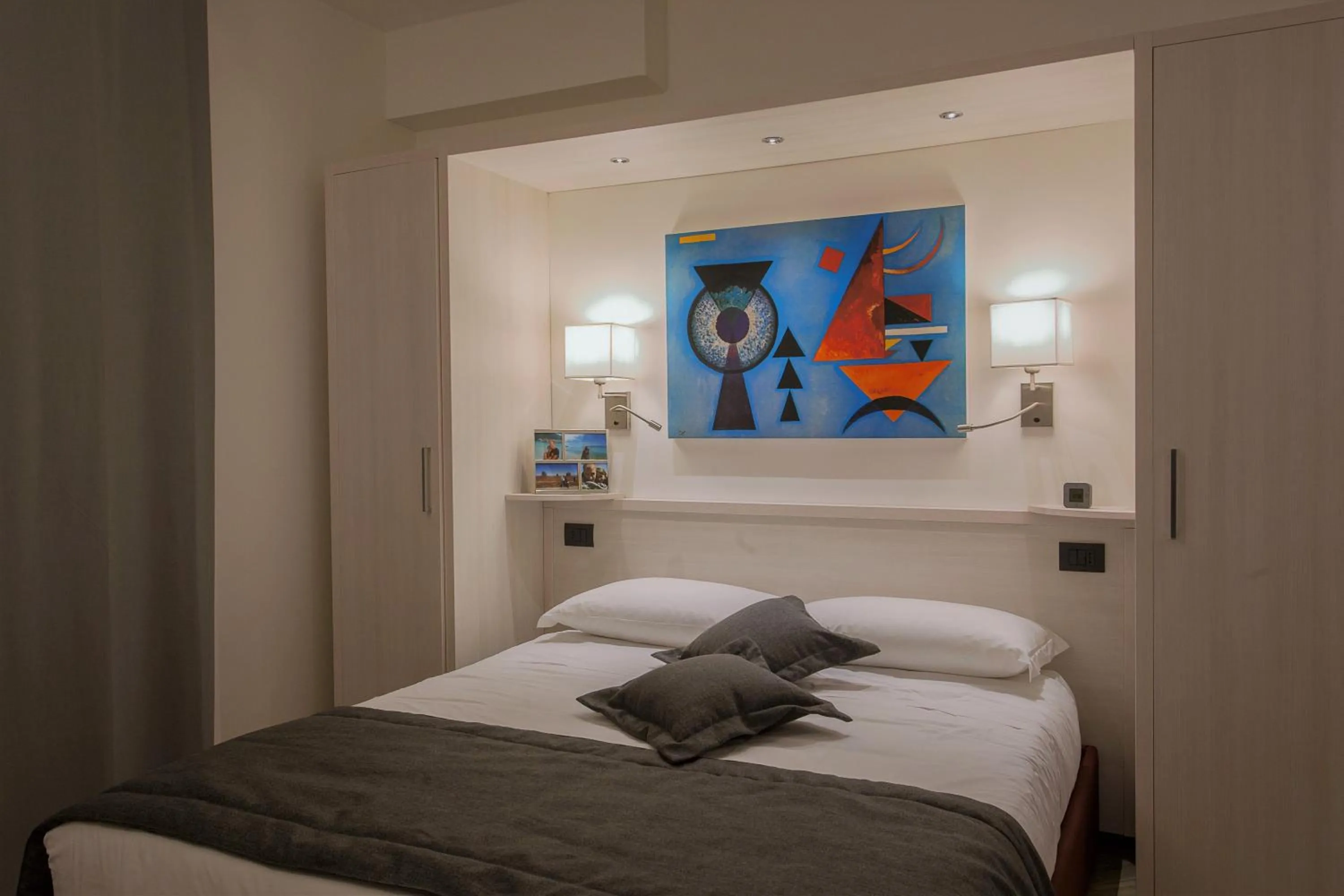 Bed in Astra Roma Apartments