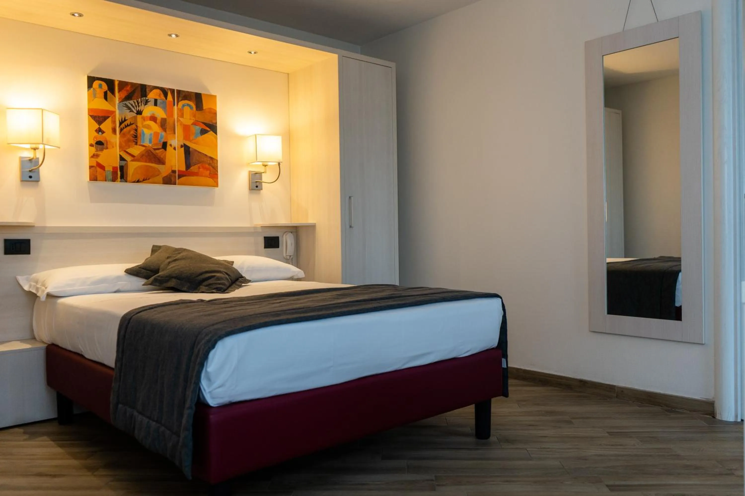 Bed in Astra Roma Apartments