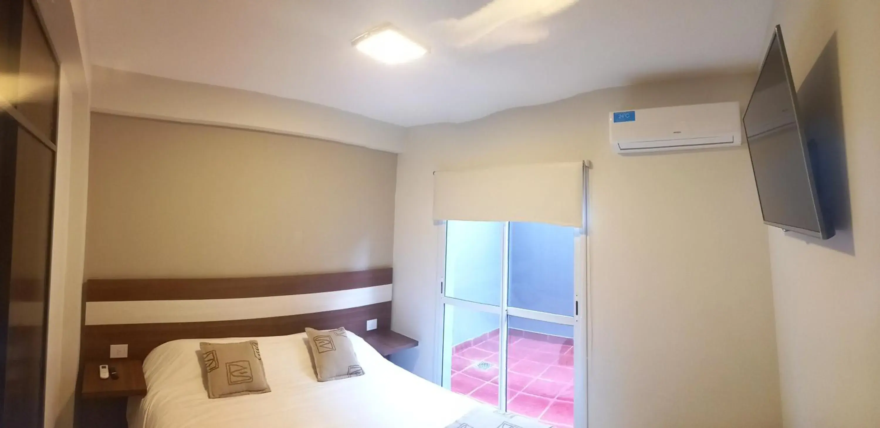 Inner courtyard view, Bed in Urquiza Suites Salta Inner courtyard view, Bed in Urquiza Suites Salta